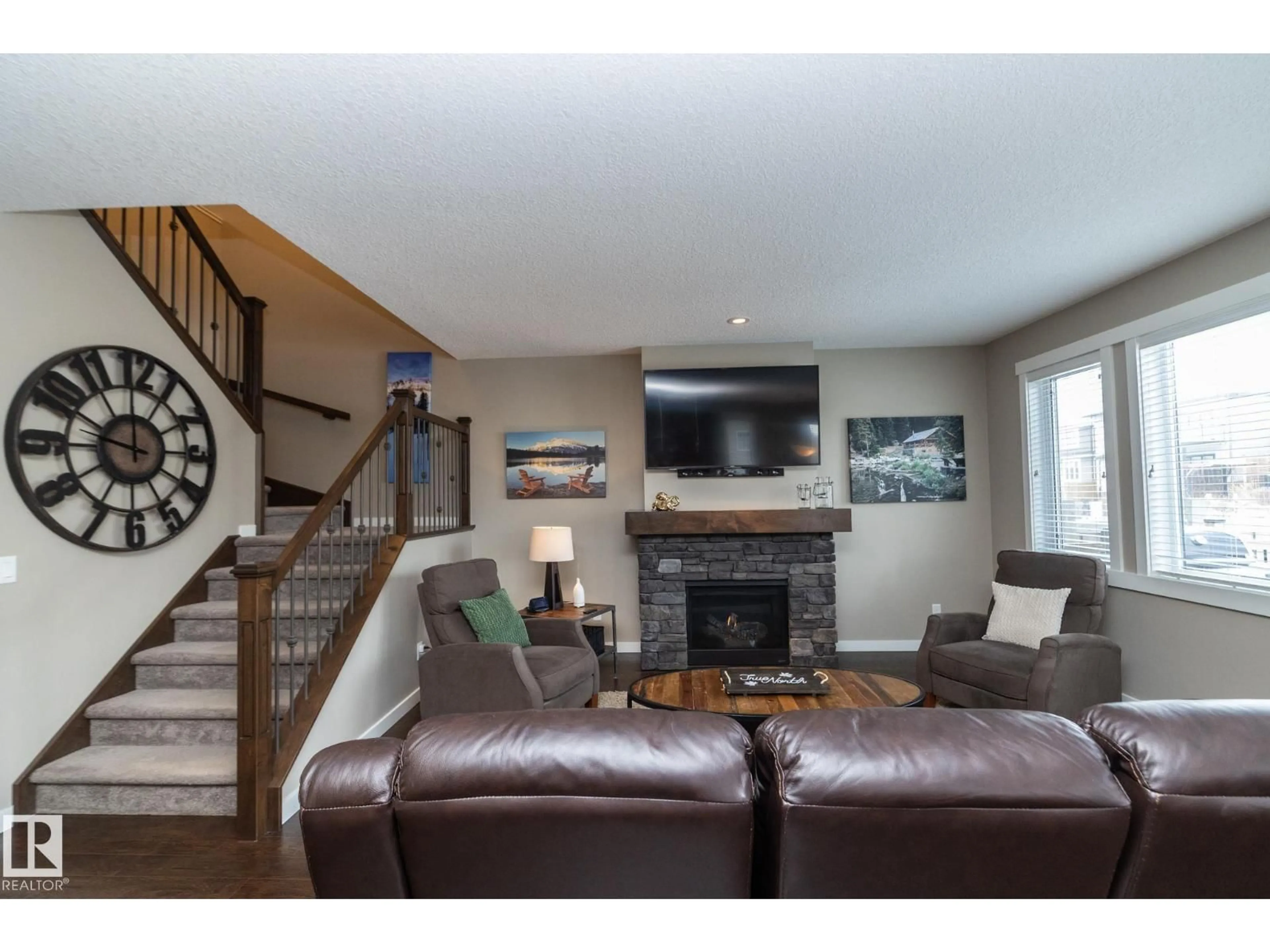 Living room with furniture, wood/laminate floor for 13020 207 ST, Edmonton Alberta T5S0K1