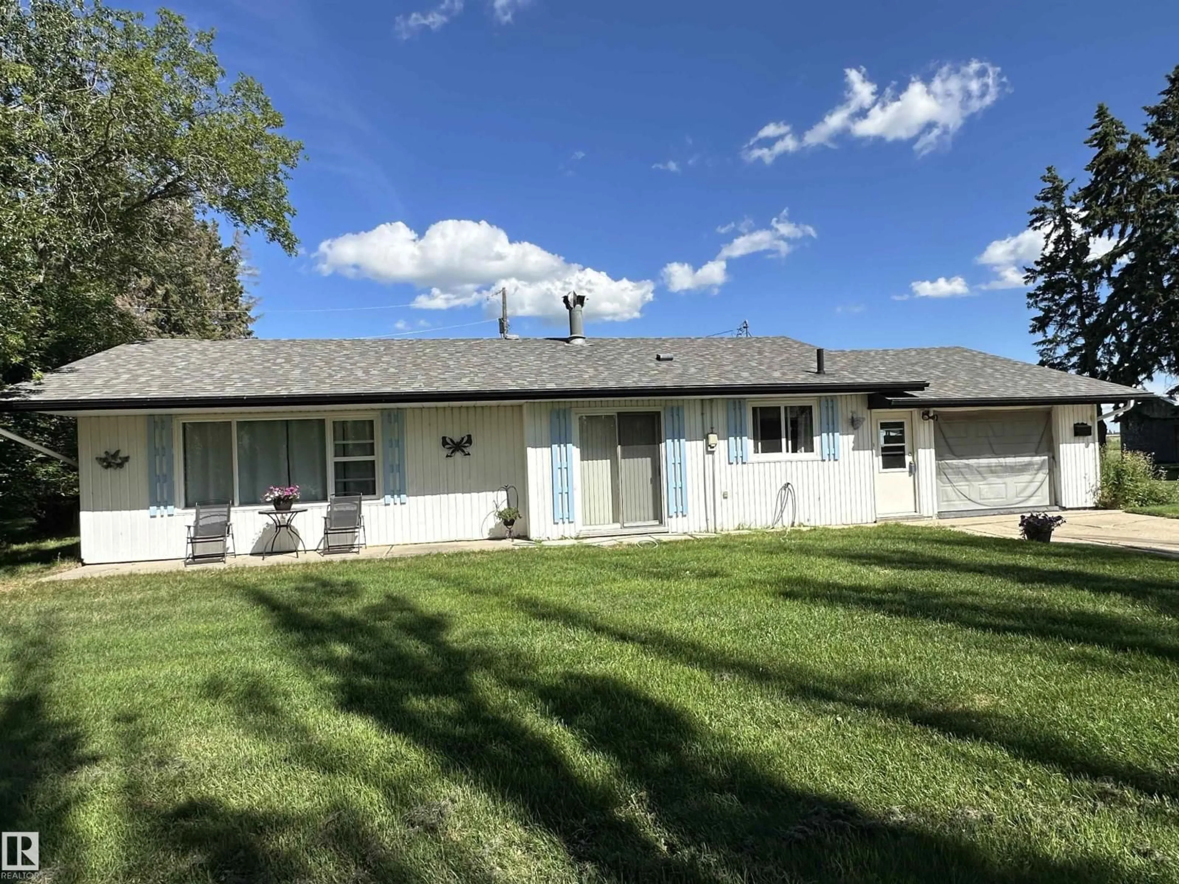 Home with vinyl exterior material, street for 241075 TWP ROAD 461, Rural Wetaskiwin County Alberta T9A1X1