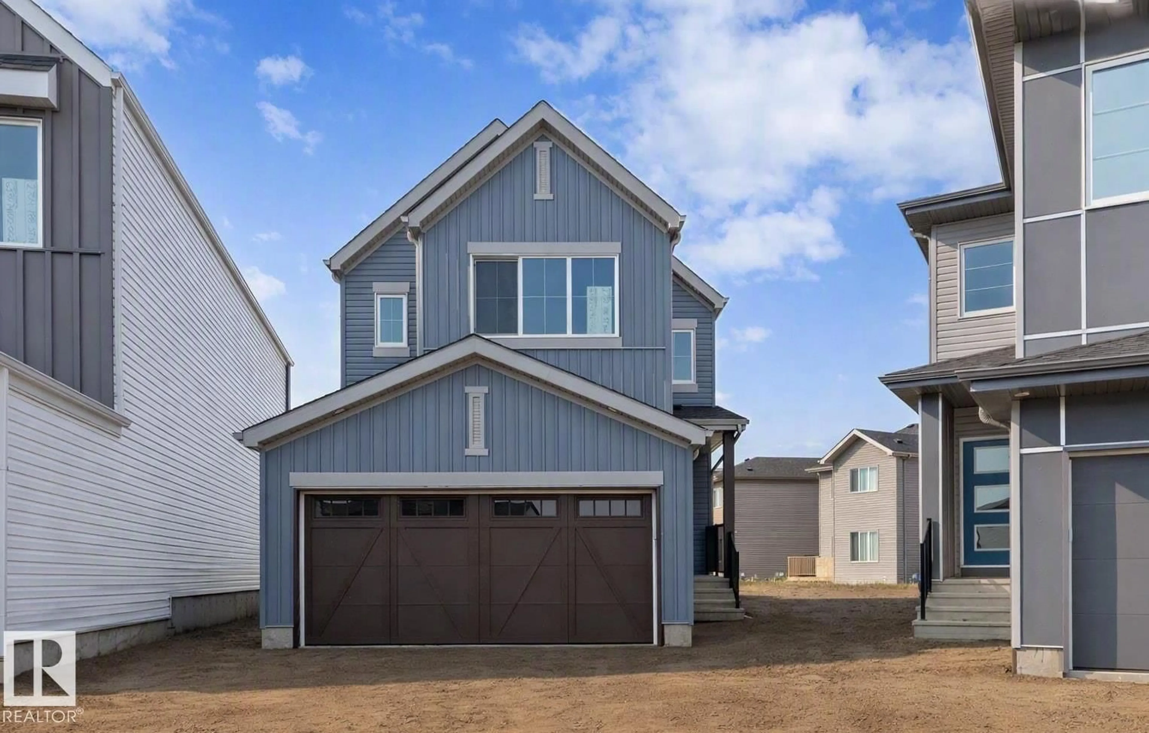 Home with vinyl exterior material, street for NW - 2708 188 ST, Edmonton Alberta T6M3J1