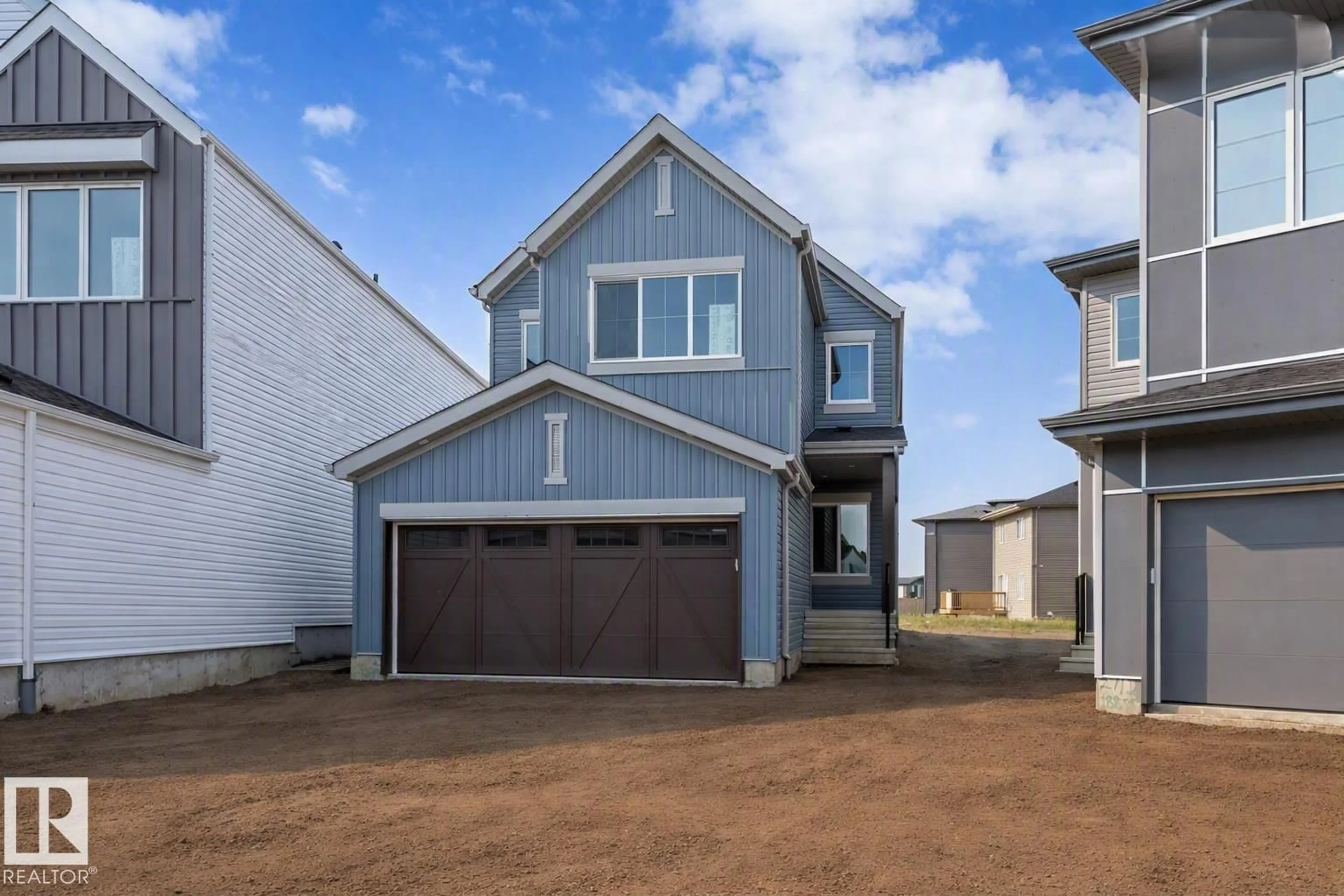Home with vinyl exterior material, street for NW - 2708 188 ST, Edmonton Alberta T6M3J1
