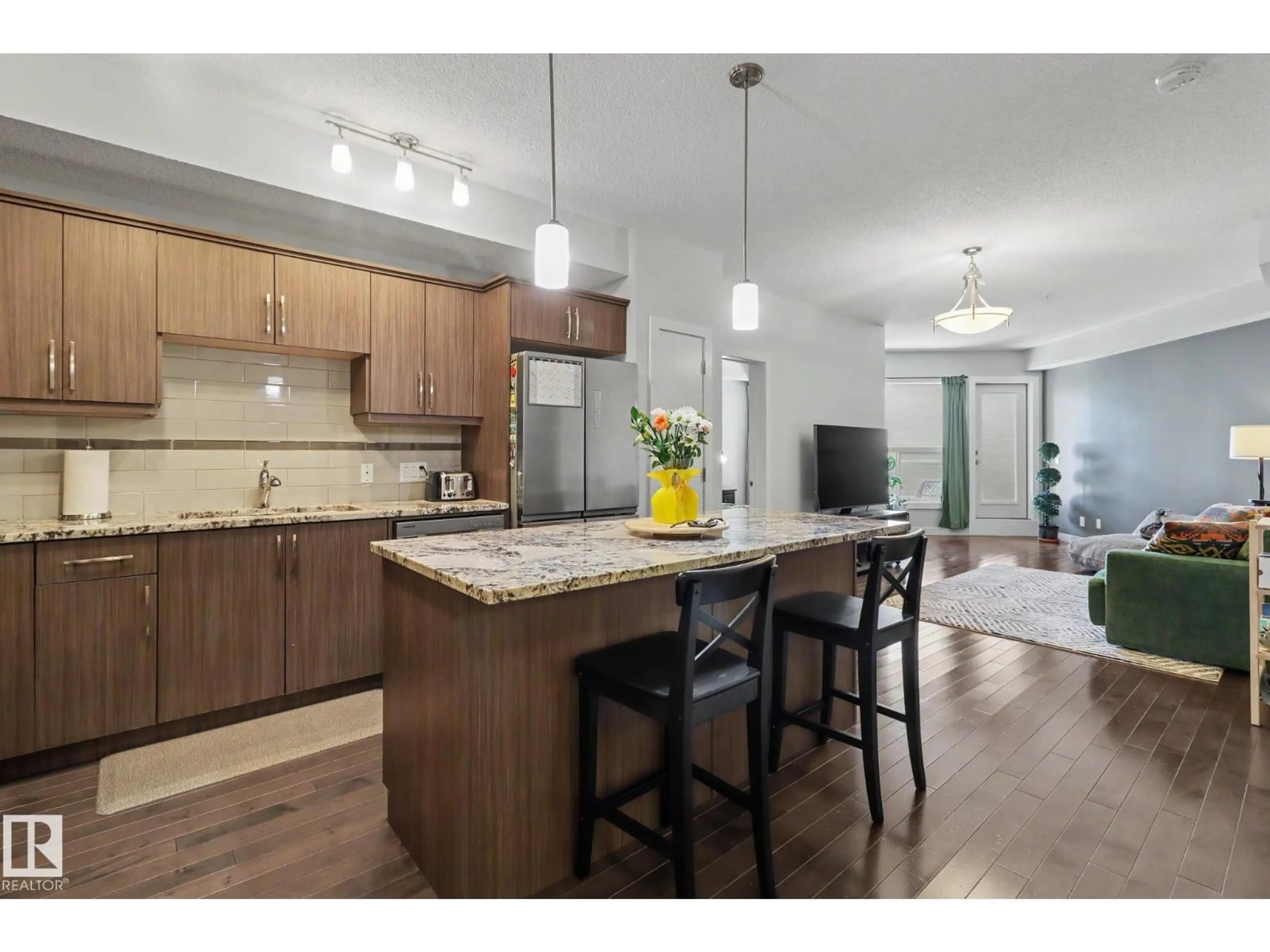 Open concept kitchen, wood/laminate floor for NW - 315 10523 123 ST, Edmonton Alberta T5N1N9