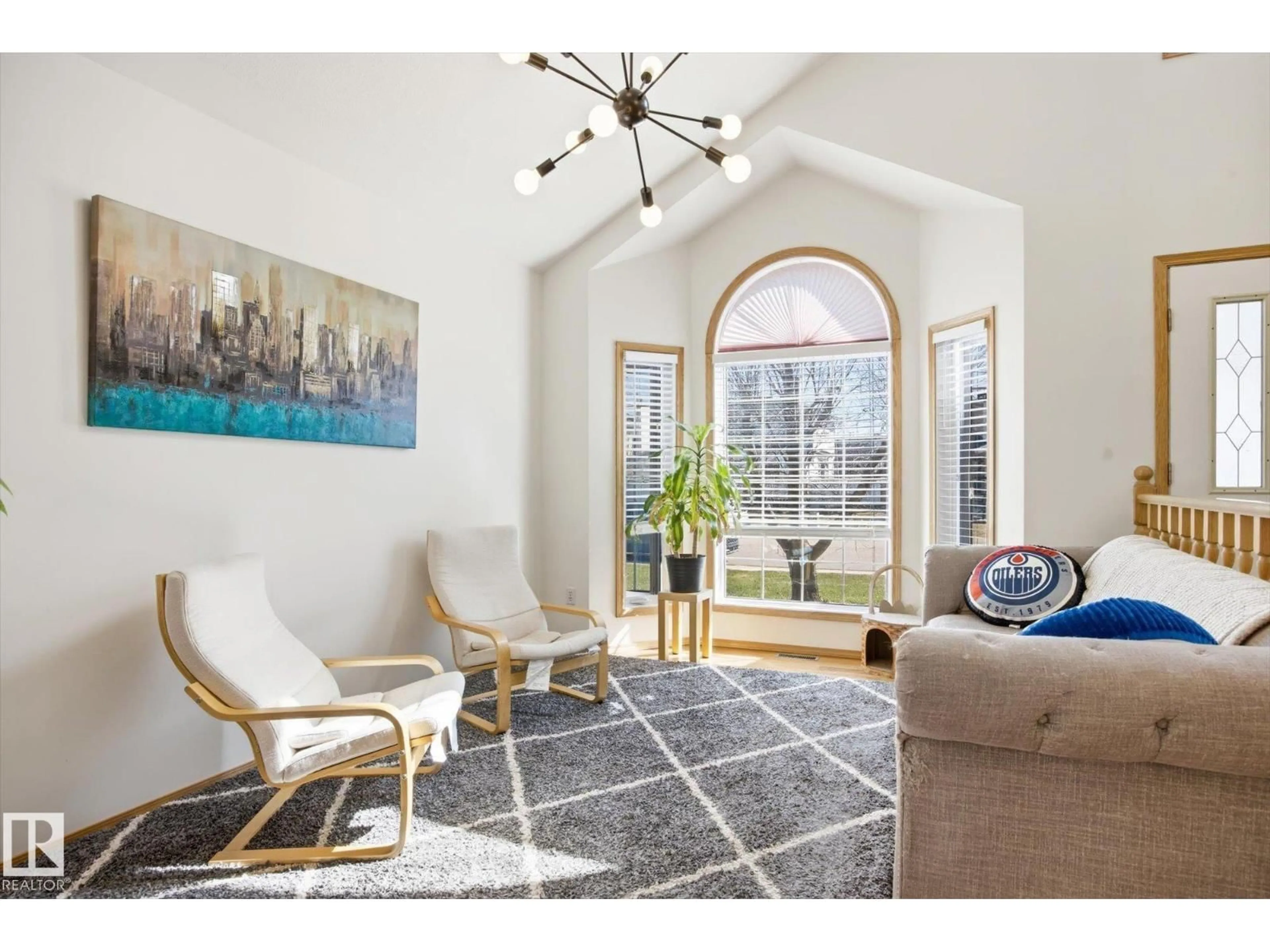 Living room with furniture, ceramic/tile floor for 7220 157 AV, Edmonton Alberta T5Z2Z7