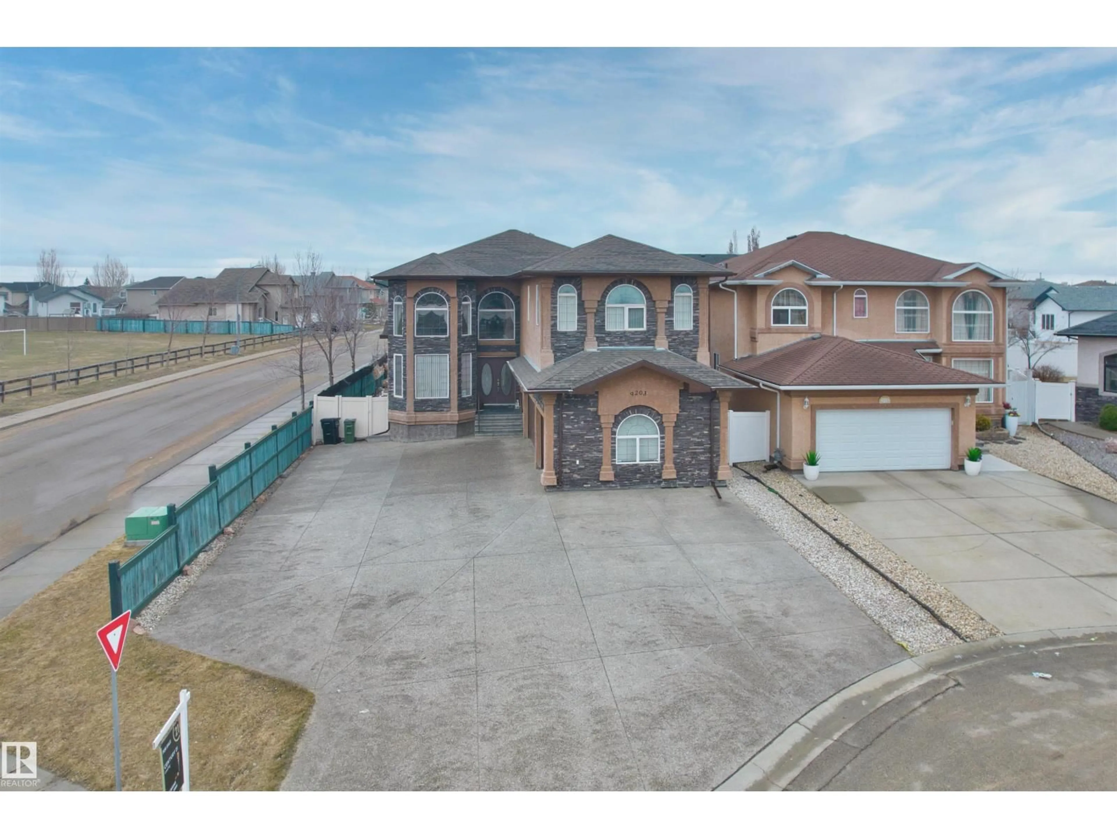 A pic from outside/outdoor area/front of a property/back of a property/a pic from drone, street for 9203 160 AV, Edmonton Alberta T5Z0A9