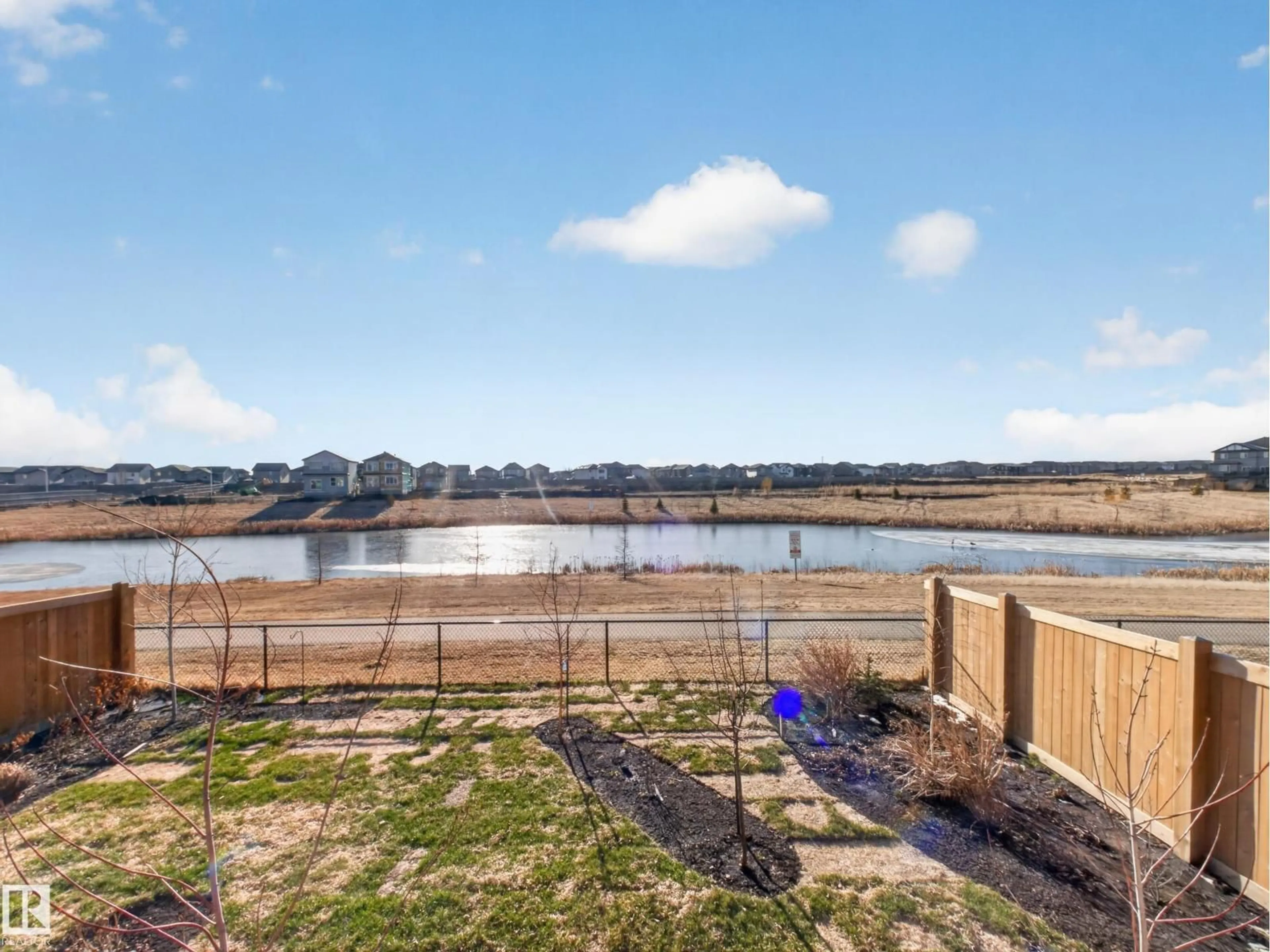A pic from outside/outdoor area/front of a property/back of a property/a pic from drone, water/lake/river/ocean view for 216 CALEDON CR, Spruce Grove Alberta T7X0T6