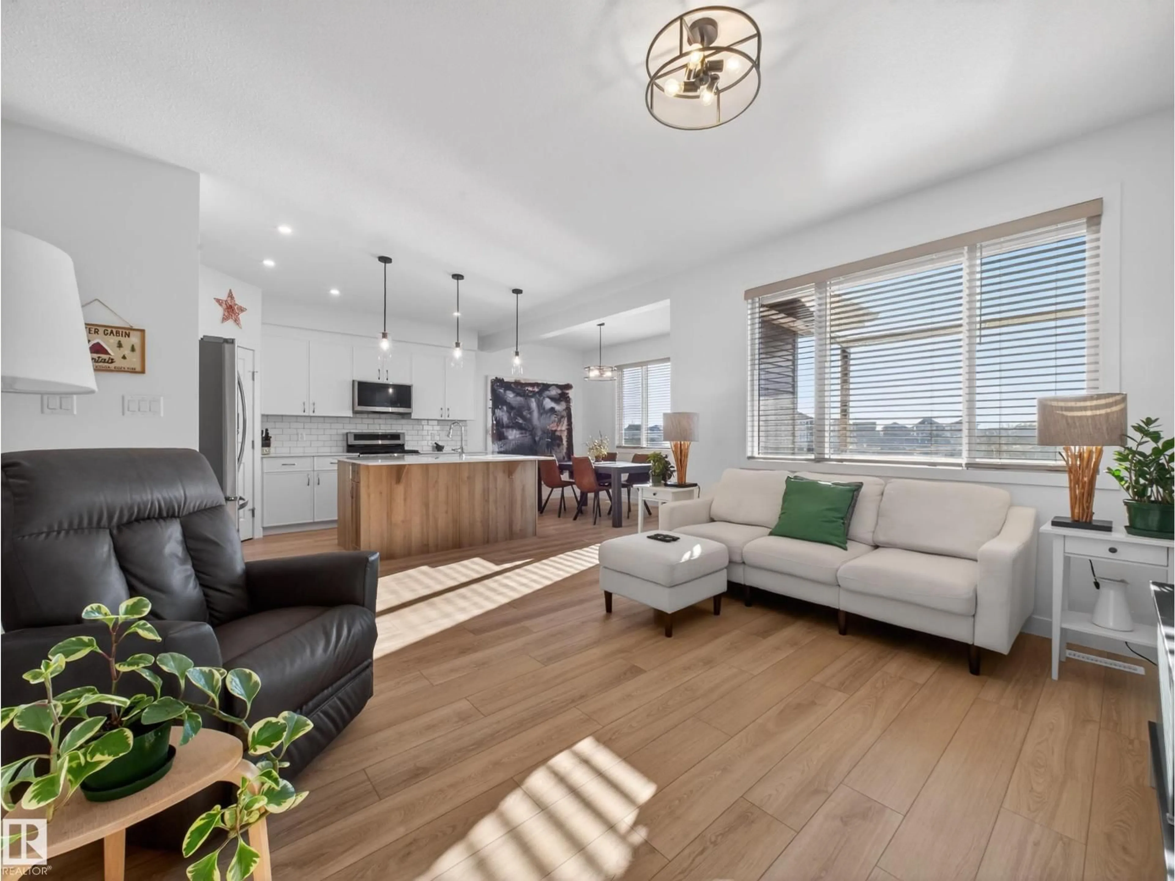 Living room with furniture, wood/laminate floor for 216 CALEDON CR, Spruce Grove Alberta T7X0T6