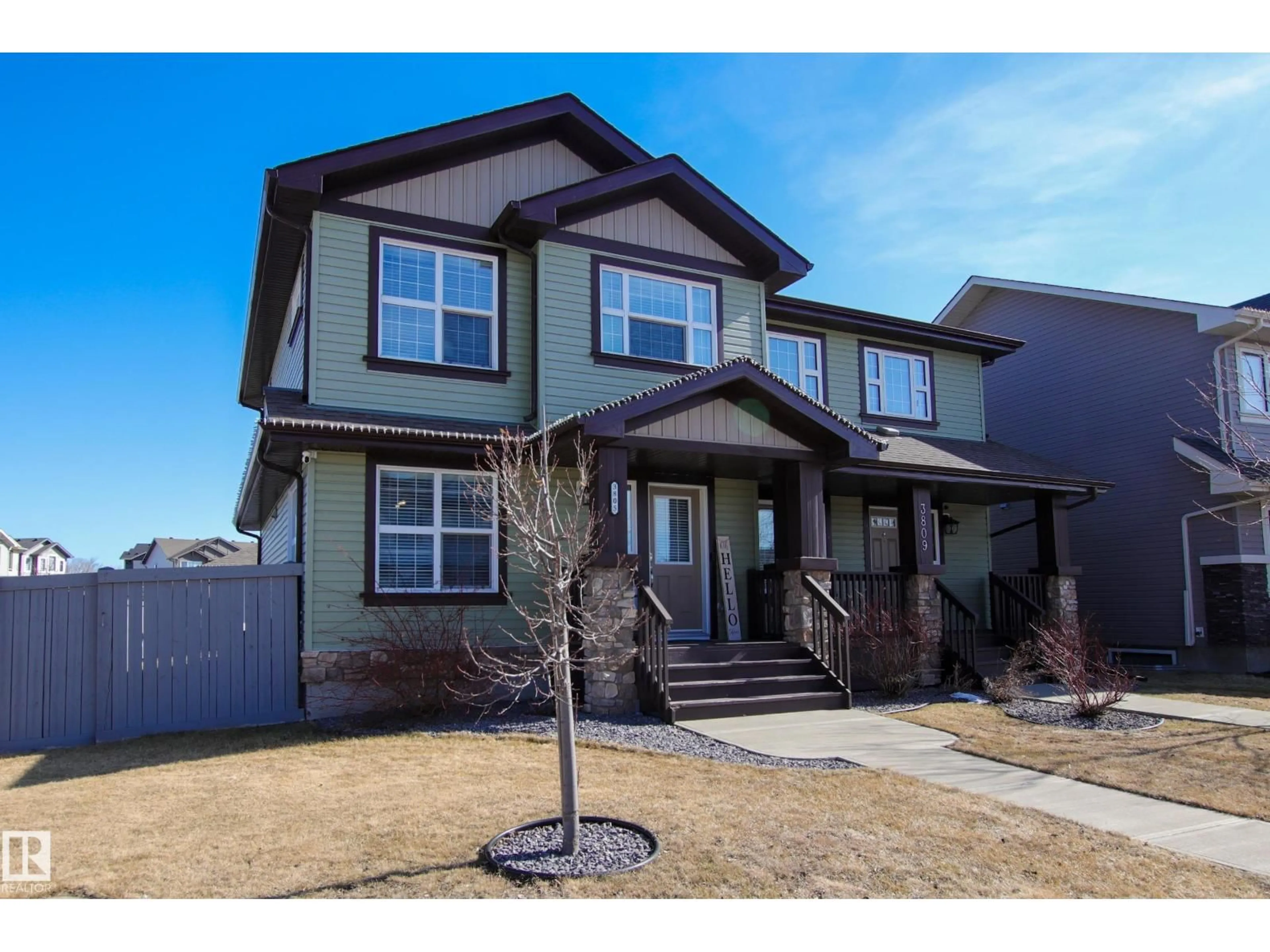 Home with vinyl exterior material, street for 3805 170A AV, Edmonton Alberta T5Y3S1