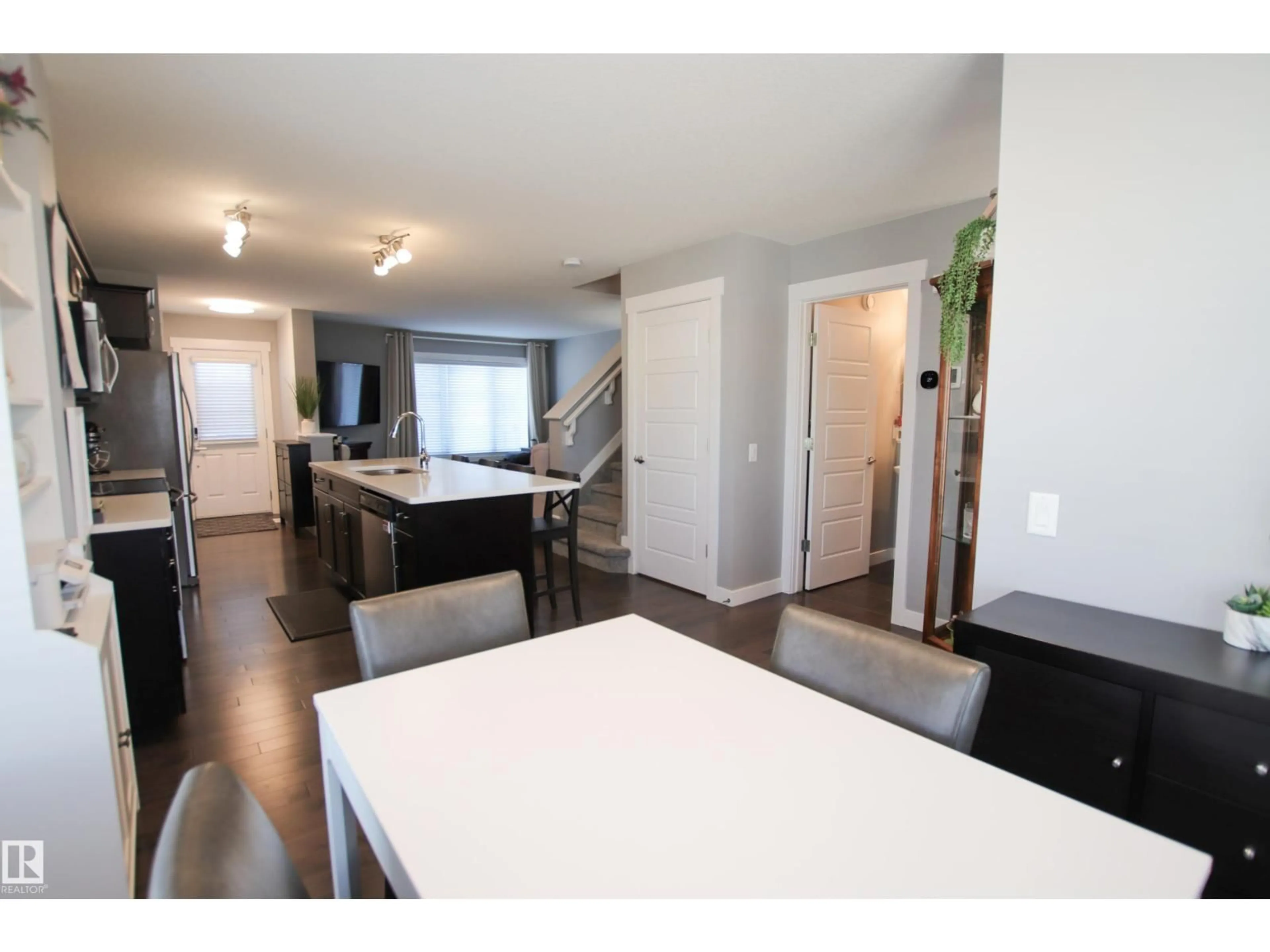 Open concept kitchen, wood/laminate floor for 3805 170A AV, Edmonton Alberta T5Y3S1