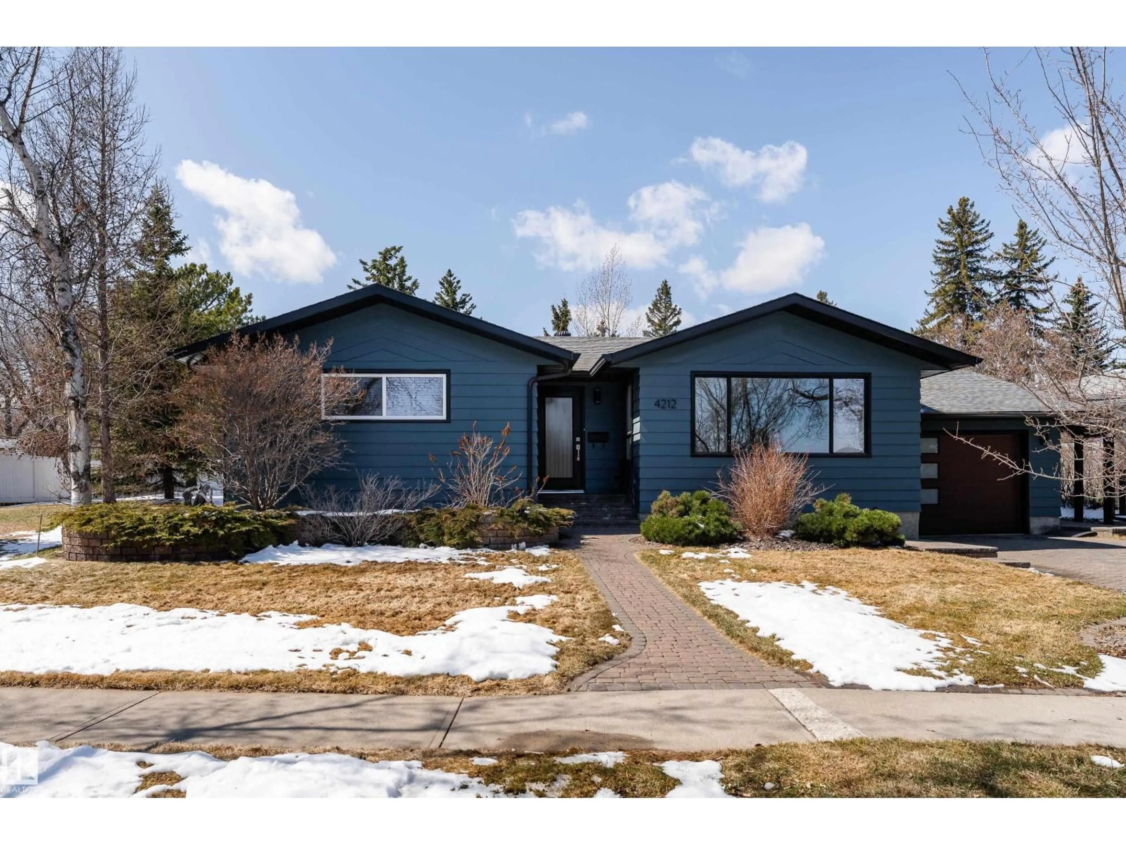 Home with vinyl exterior material, street for 4212 52 ST, Camrose Alberta T4V1T4