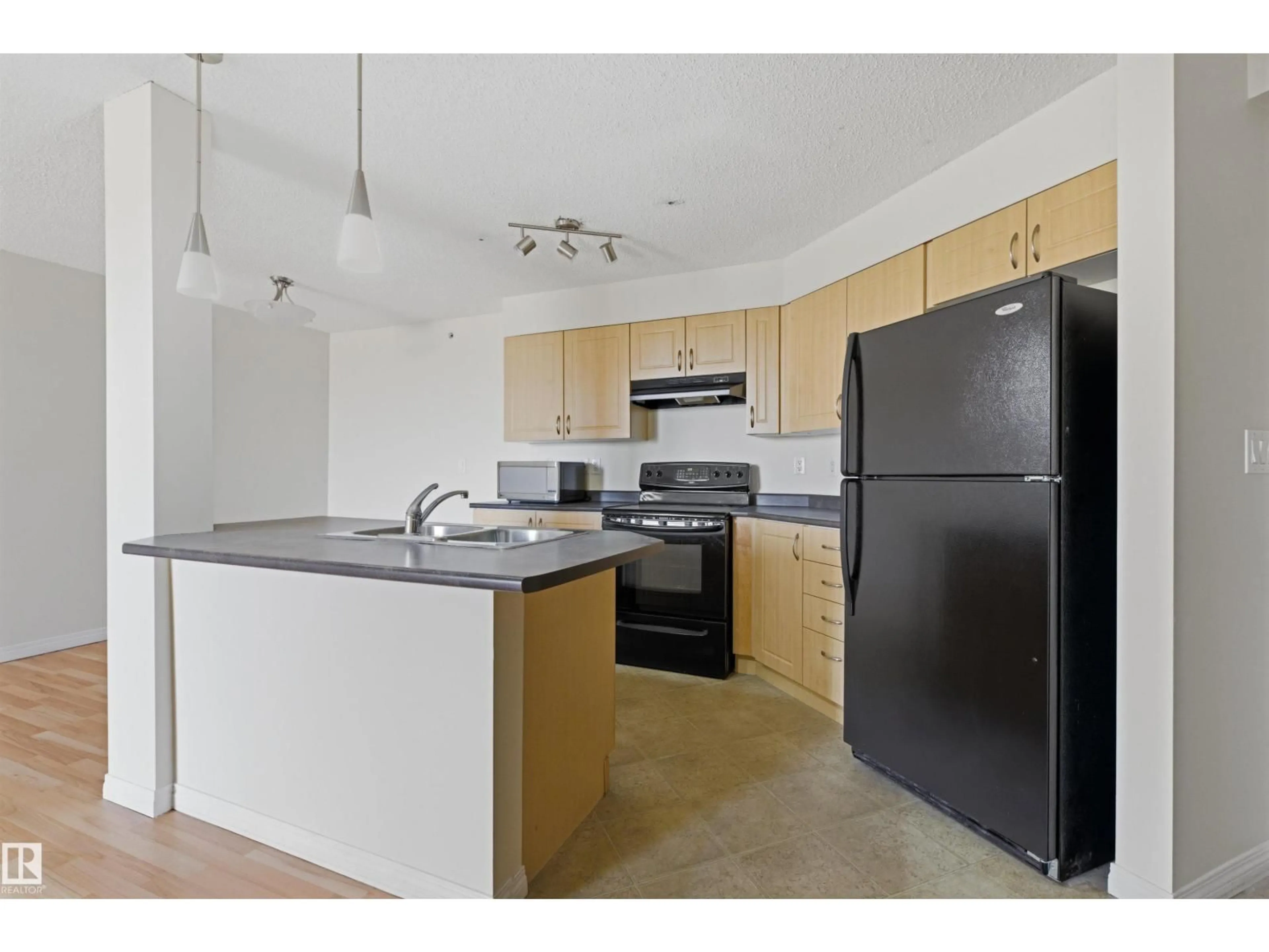 Standard kitchen, unknown for 407 - 11453 ELLERSLIE RD, Edmonton Alberta T6W1T3