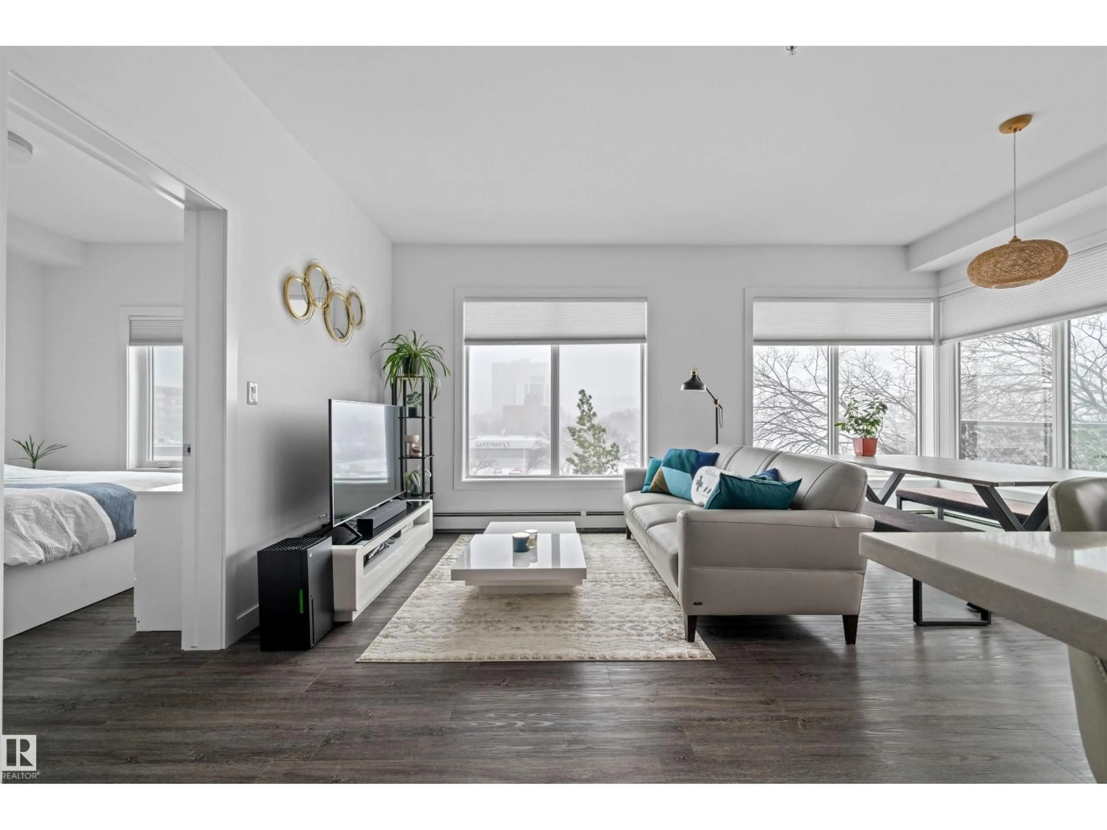 Living room with furniture, wood/laminate floor for #408 - 10837 83 AV, Edmonton Alberta T6E2E6