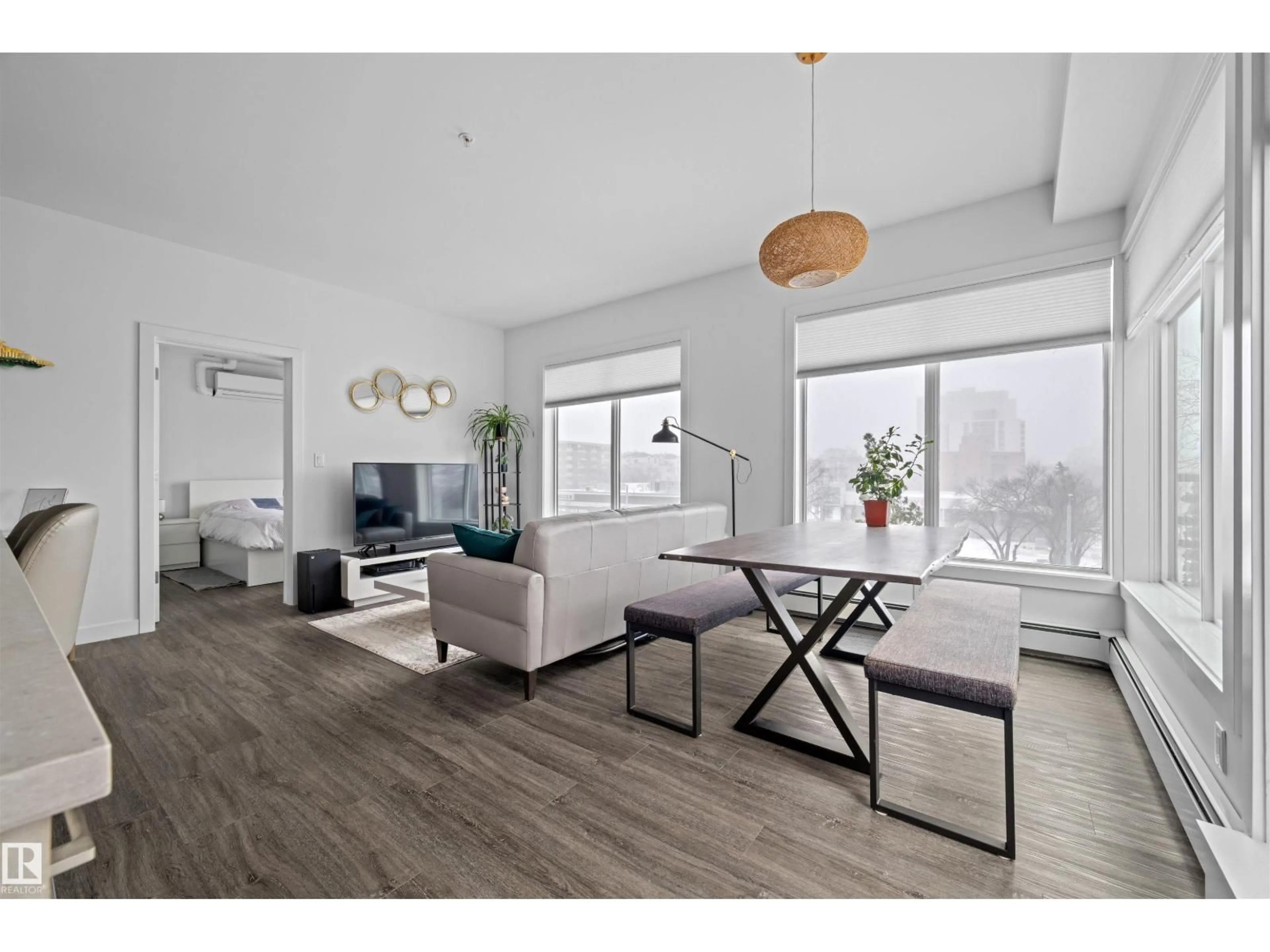 Living room with furniture, wood/laminate floor for #408 - 10837 83 AV, Edmonton Alberta T6E2E6