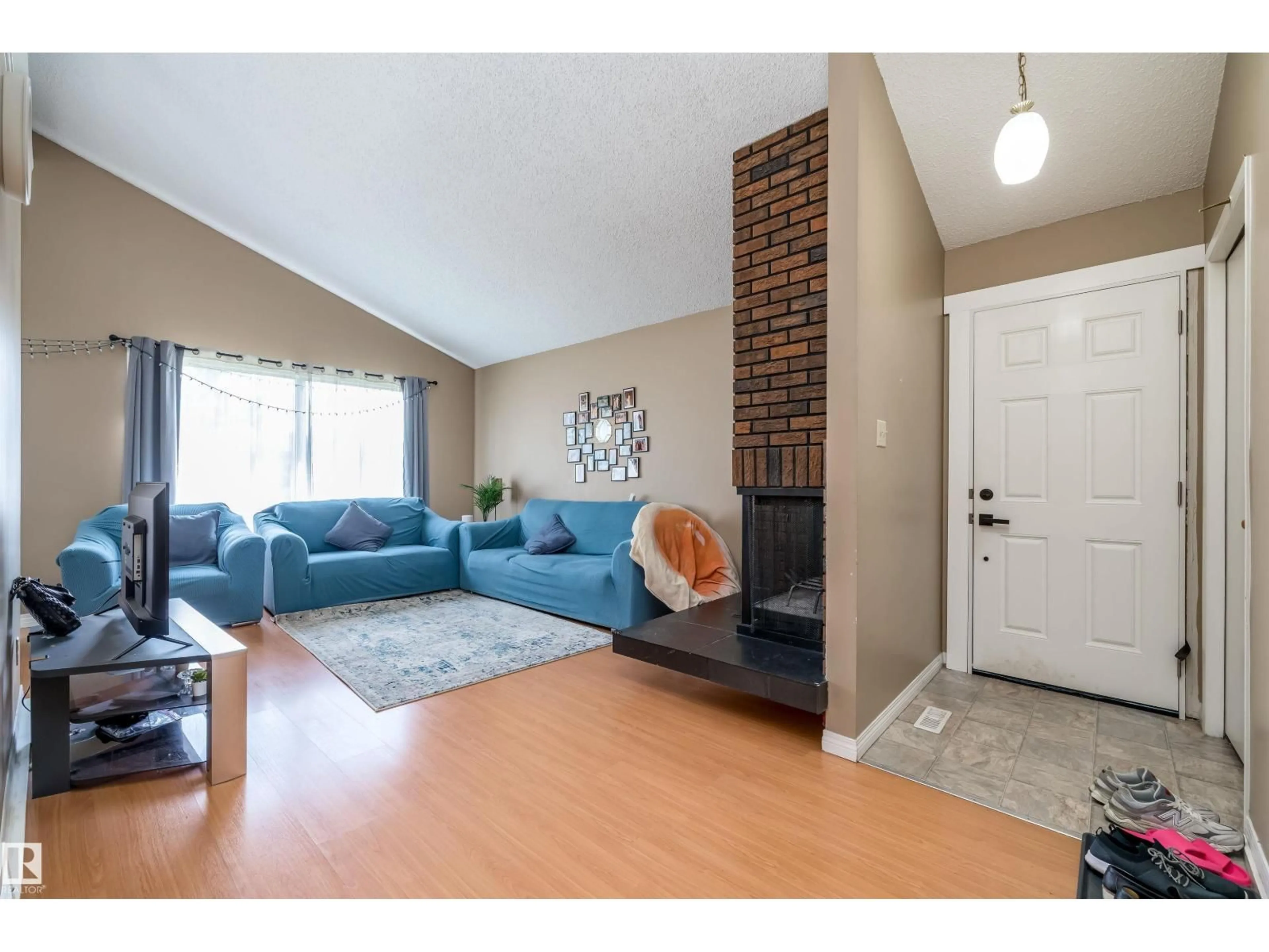 Living room with furniture, unknown for 3620 42A AV, Edmonton Alberta T6L4N7