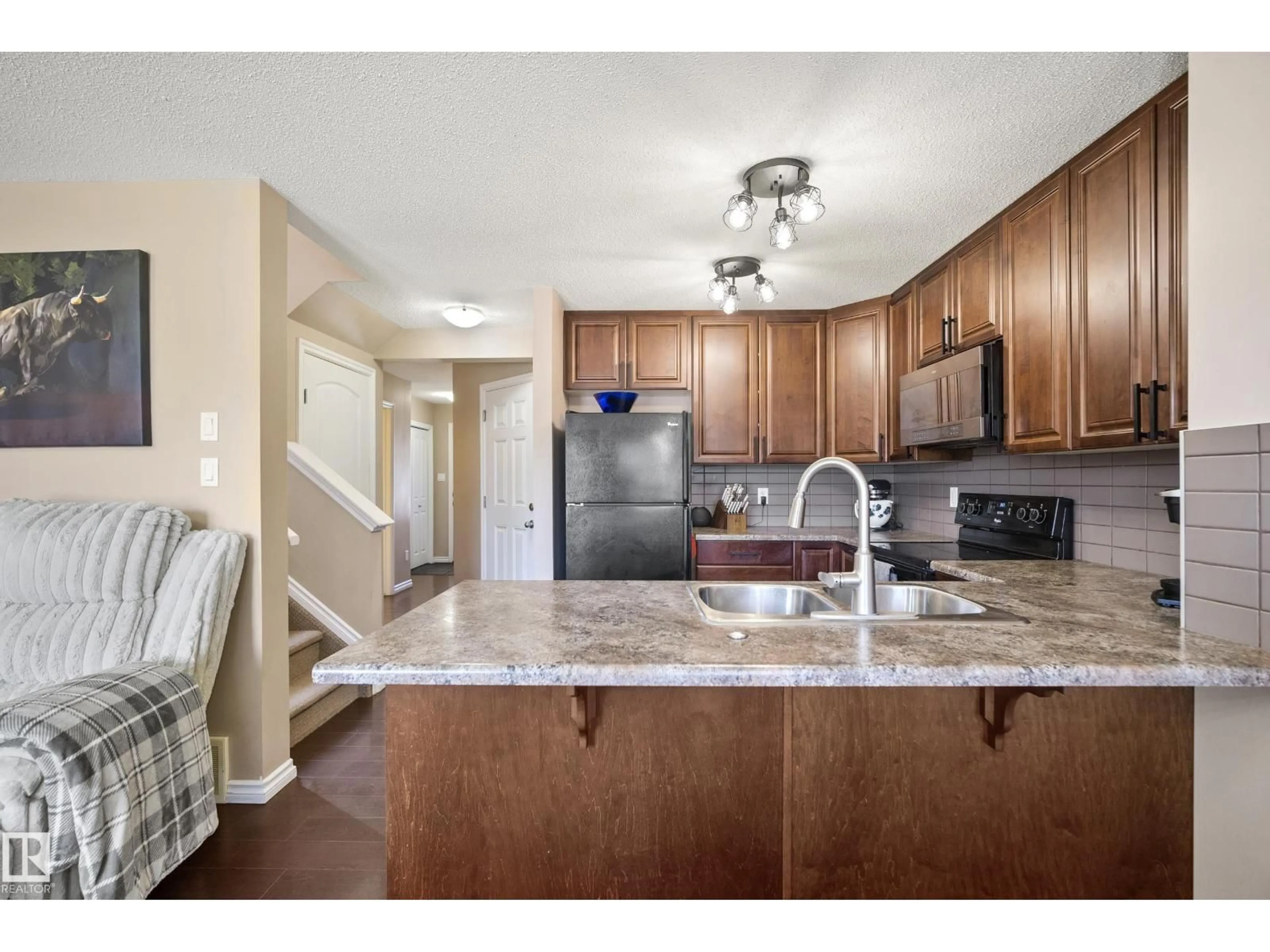 Open concept kitchen, unknown for #9 - 9231 213 ST, Edmonton Alberta T5T4K1