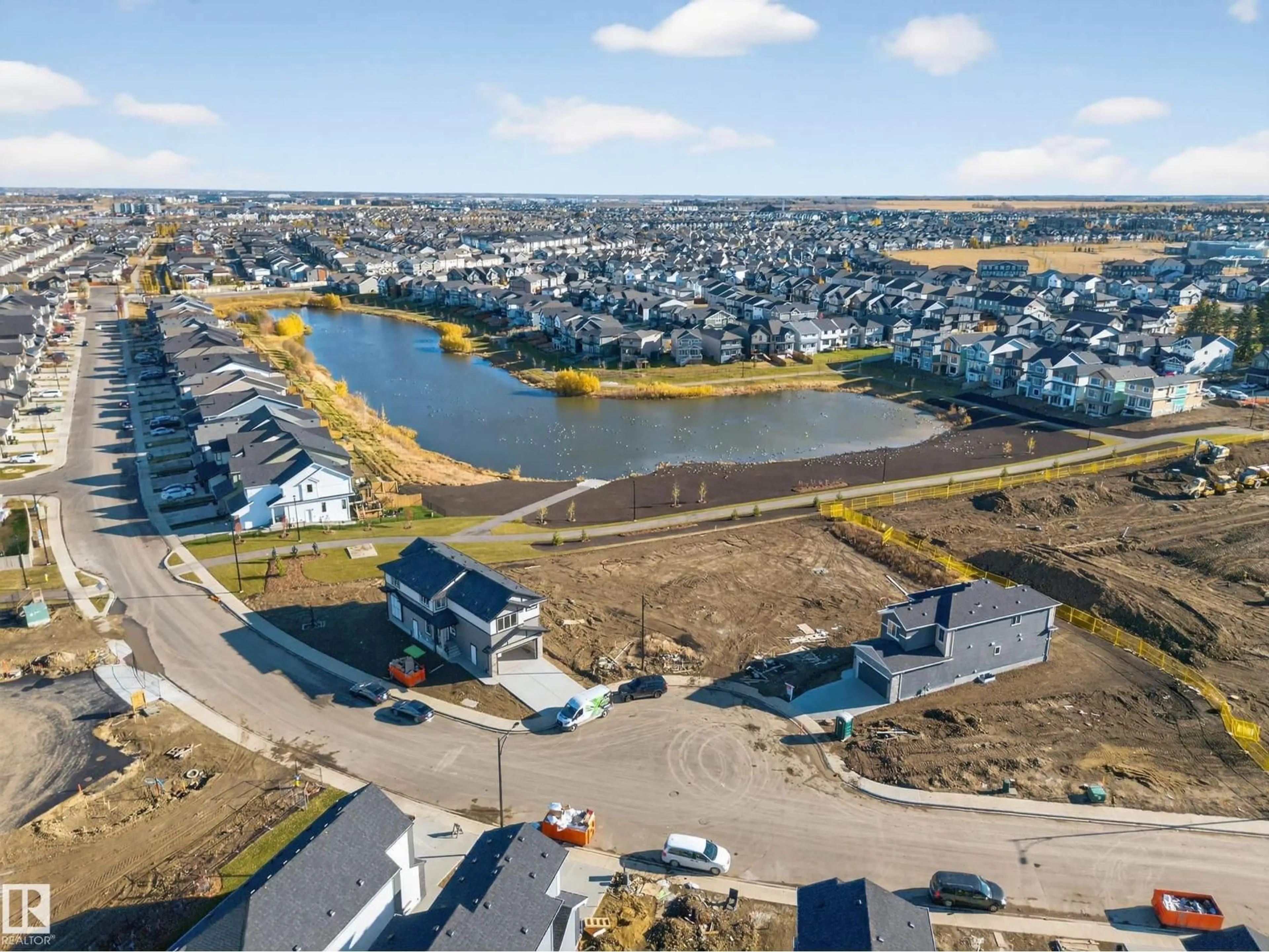 A pic from outside/outdoor area/front of a property/back of a property/a pic from drone, water/lake/river/ocean view for 3285 CHERNOWSKI WAY, Edmonton Alberta T6W5K6