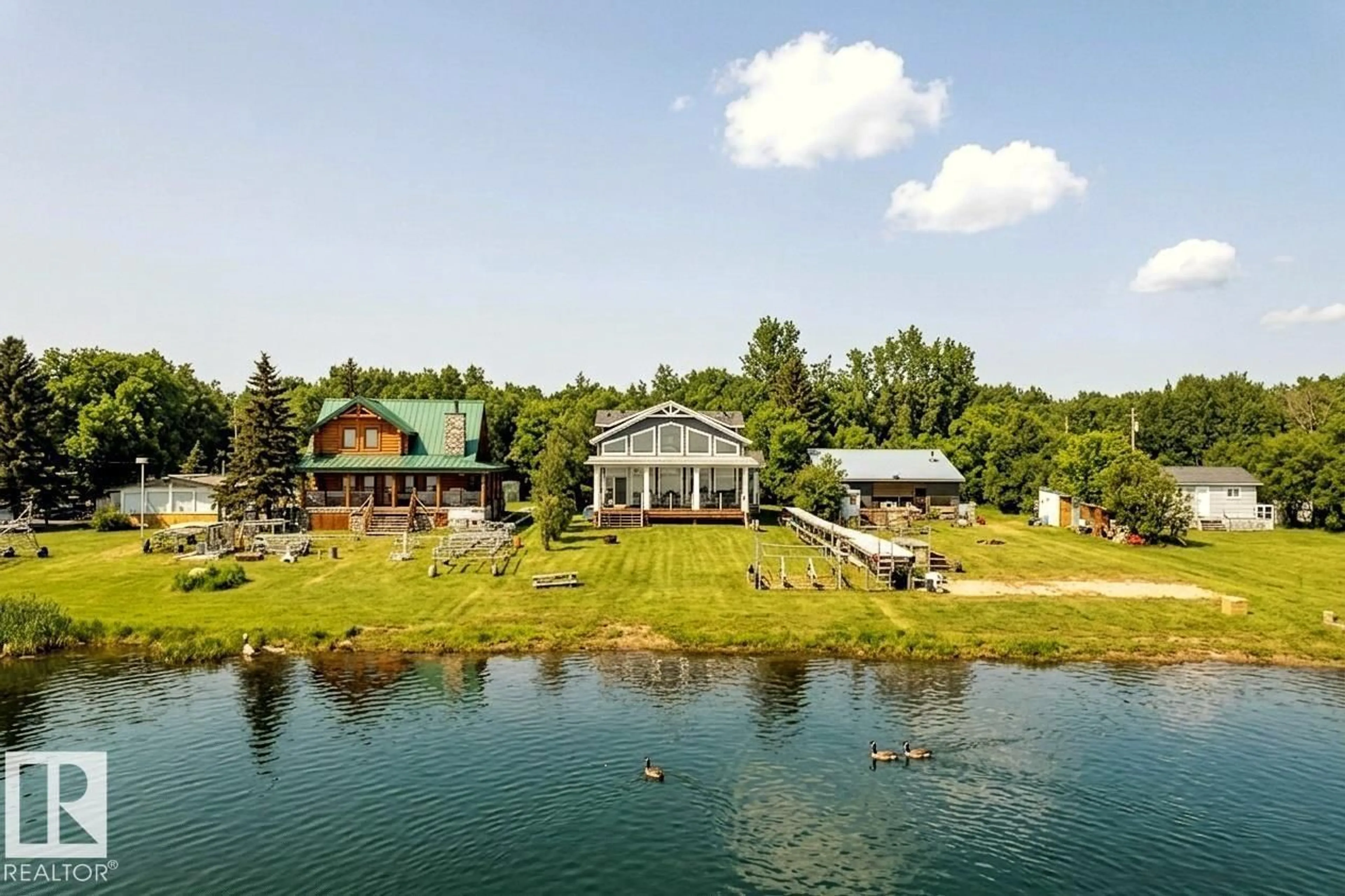 A pic from outside/outdoor area/front of a property/back of a property/a pic from drone, water/lake/river/ocean view for 53025 - 39 RGE ROAD 43, Rural Parkland County Alberta T0E2K0