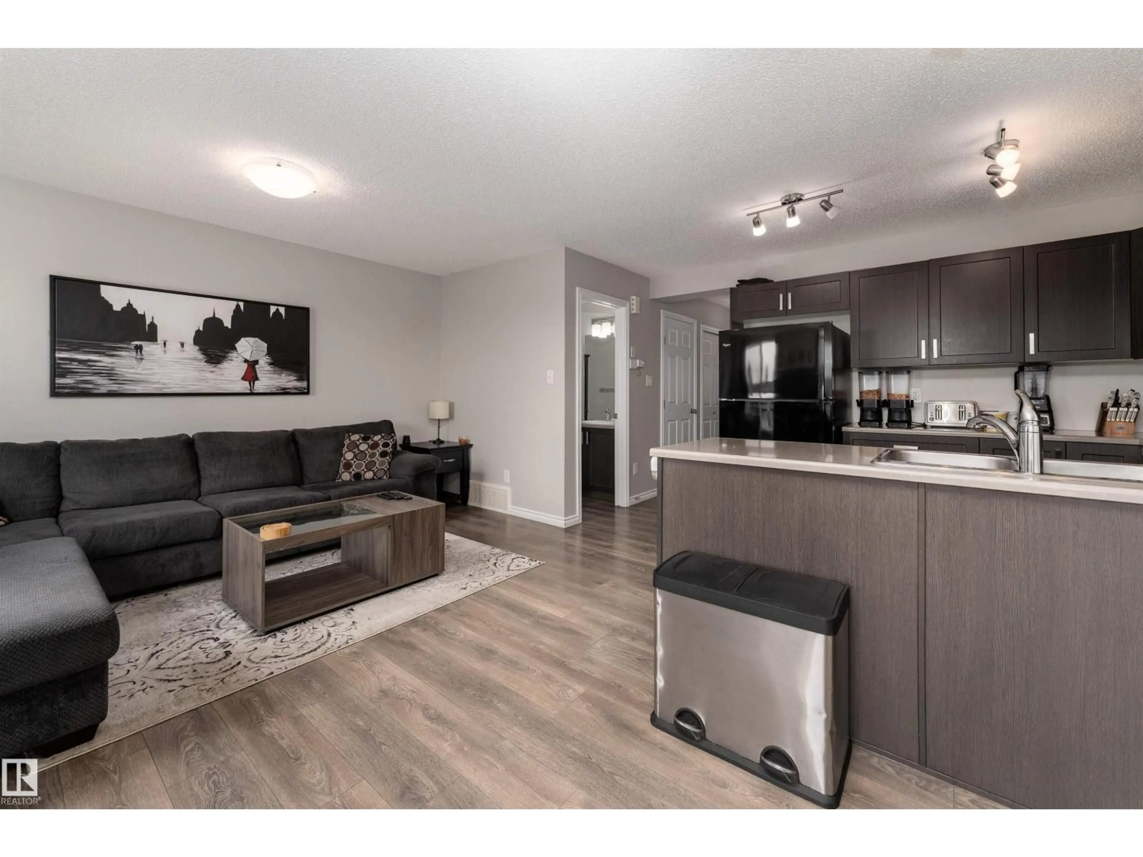 Open concept kitchen, wood/laminate floor for 521 EBBERS WY, Edmonton Alberta T5Y3T8