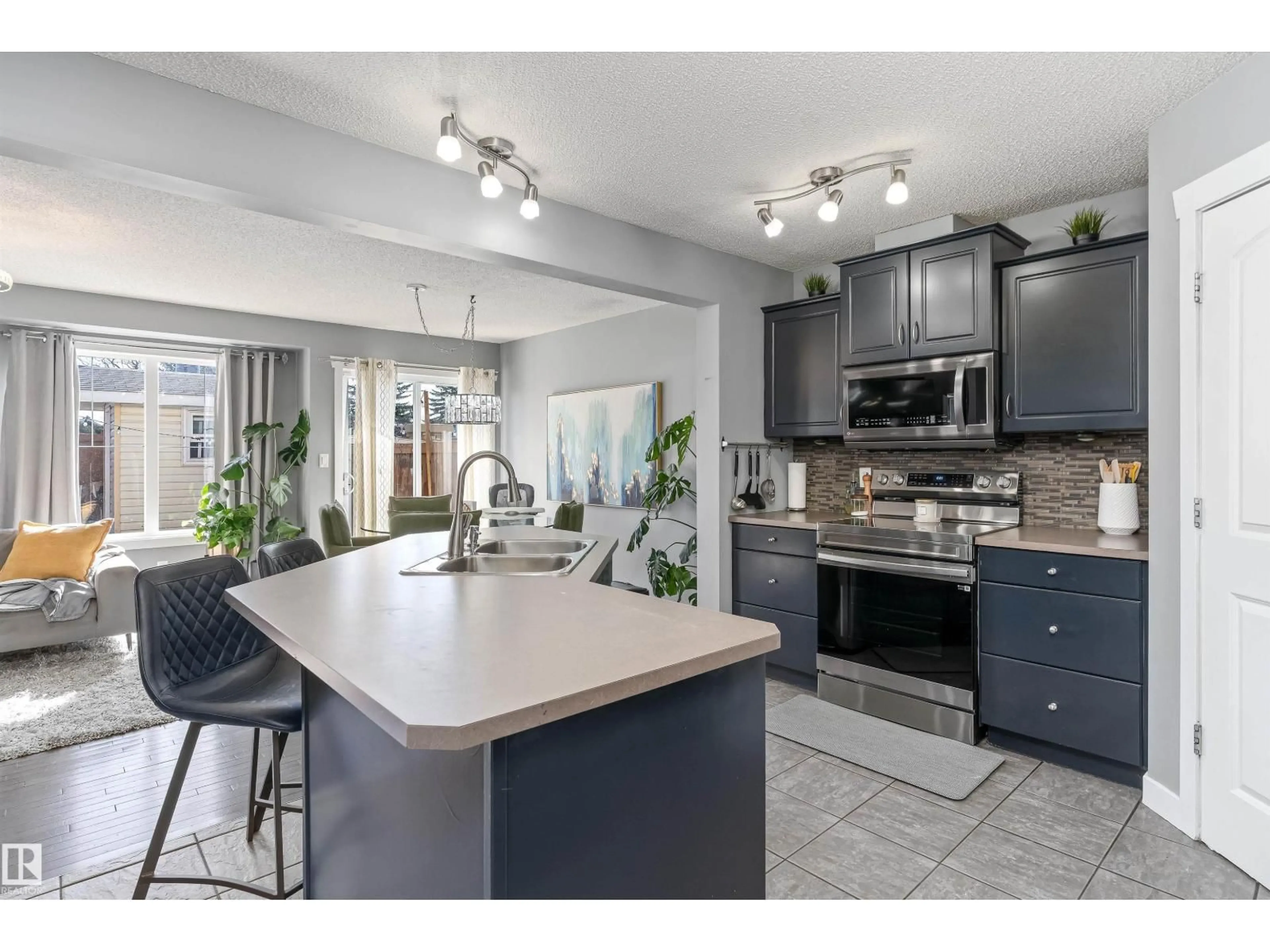 Open concept kitchen, ceramic/tile floor for NW - 82 14208 ST, Edmonton Alberta T5Y0E4