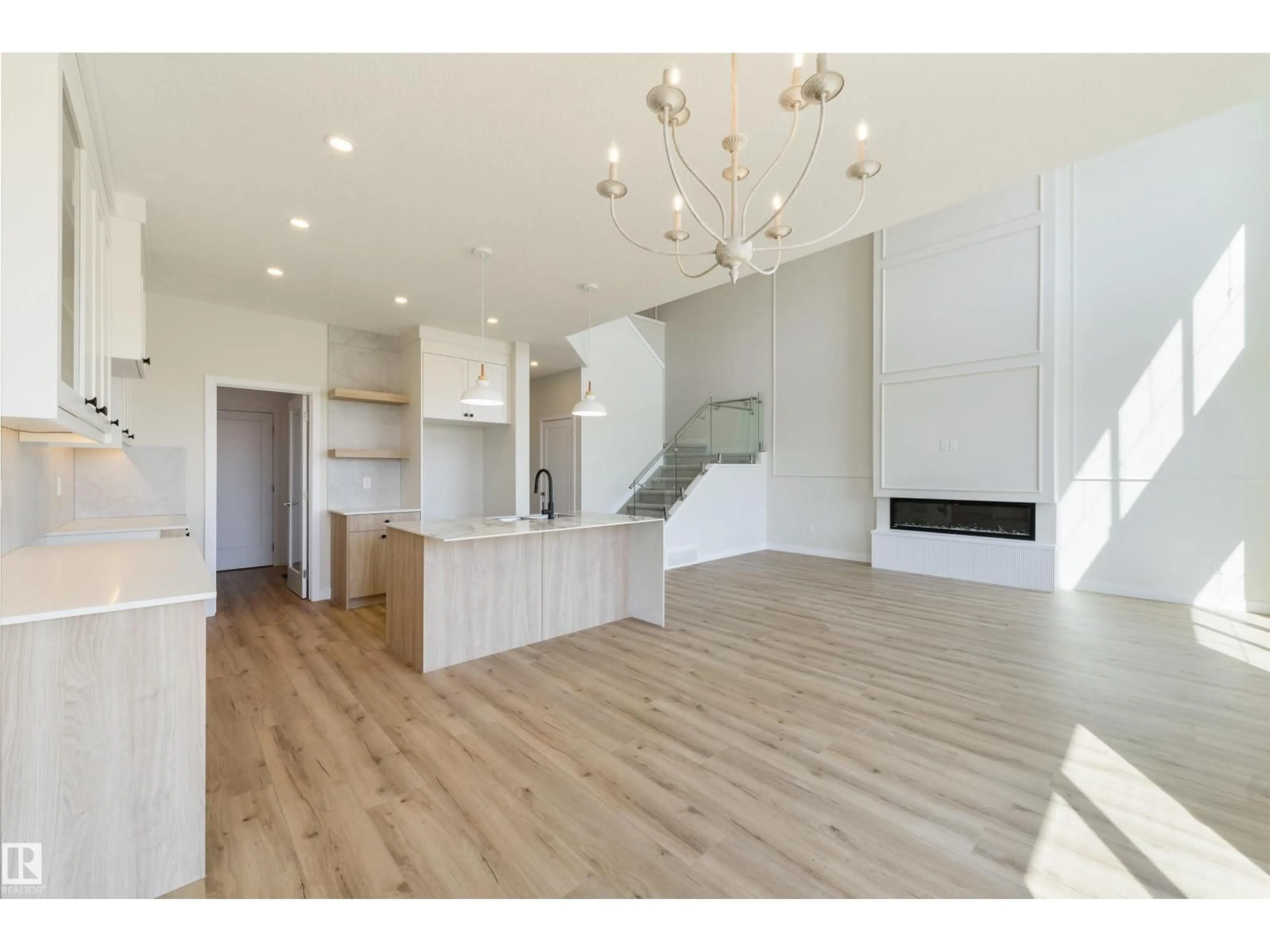 Open concept kitchen, wood/laminate floor for 1443 OSPREY CT, Edmonton Alberta T5S0H7