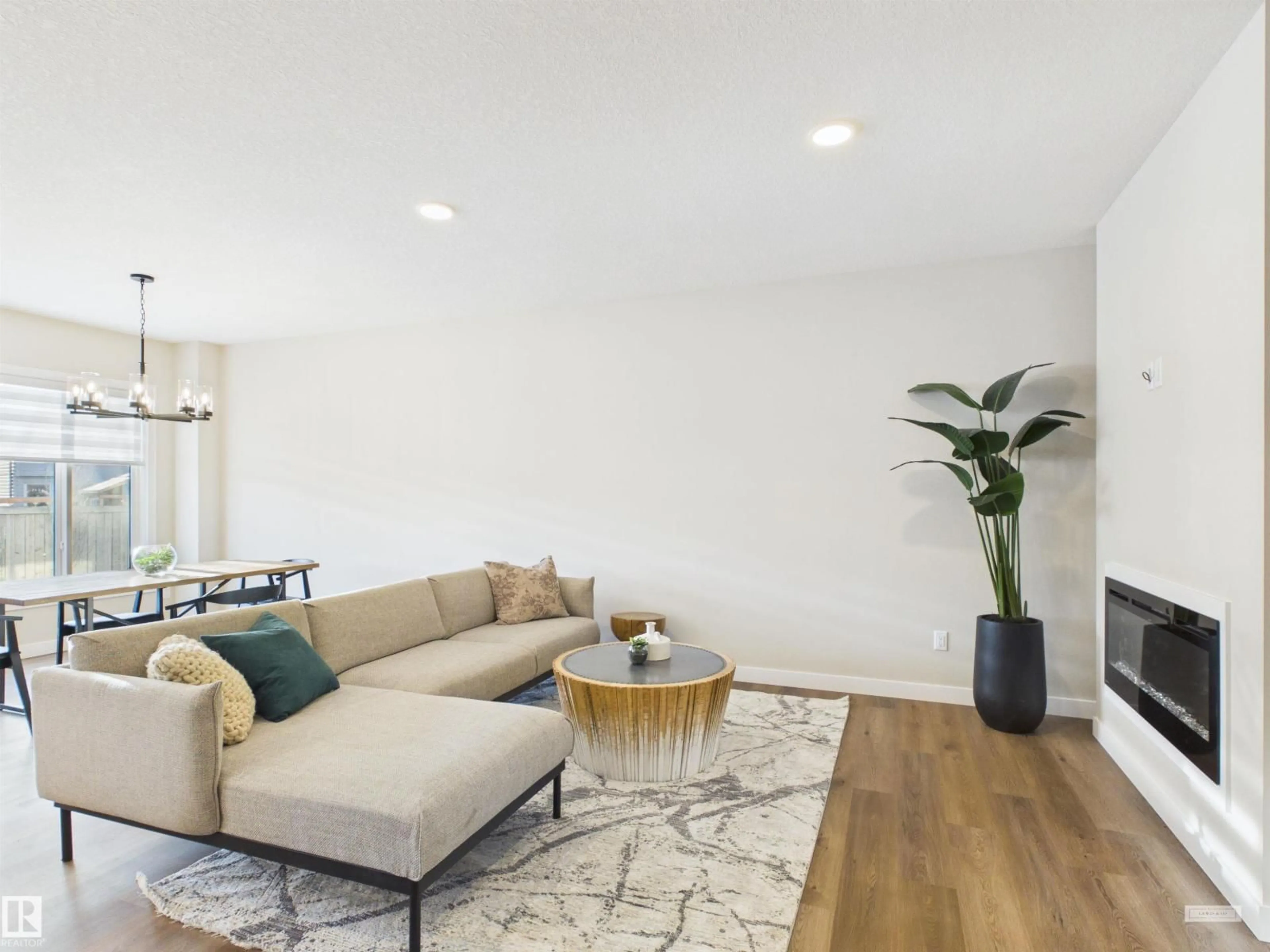 Living room with furniture, wood/laminate floor for 3 EMERSON LD, Spruce Grove Alberta T7X4S2