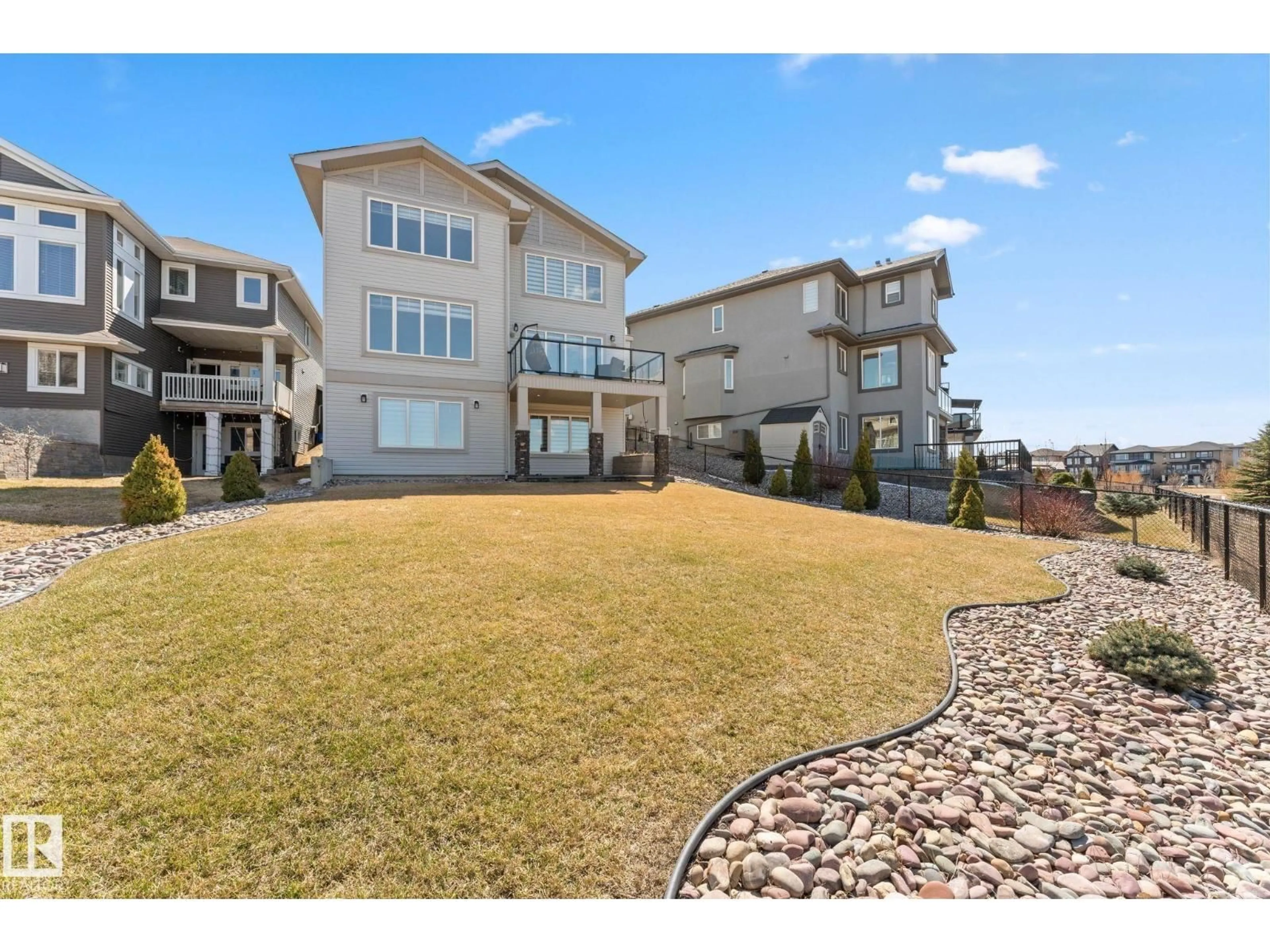 A pic from outside/outdoor area/front of a property/back of a property/a pic from drone, water/lake/river/ocean view for 7640 179 AV NW, Edmonton Alberta T5Z0L2