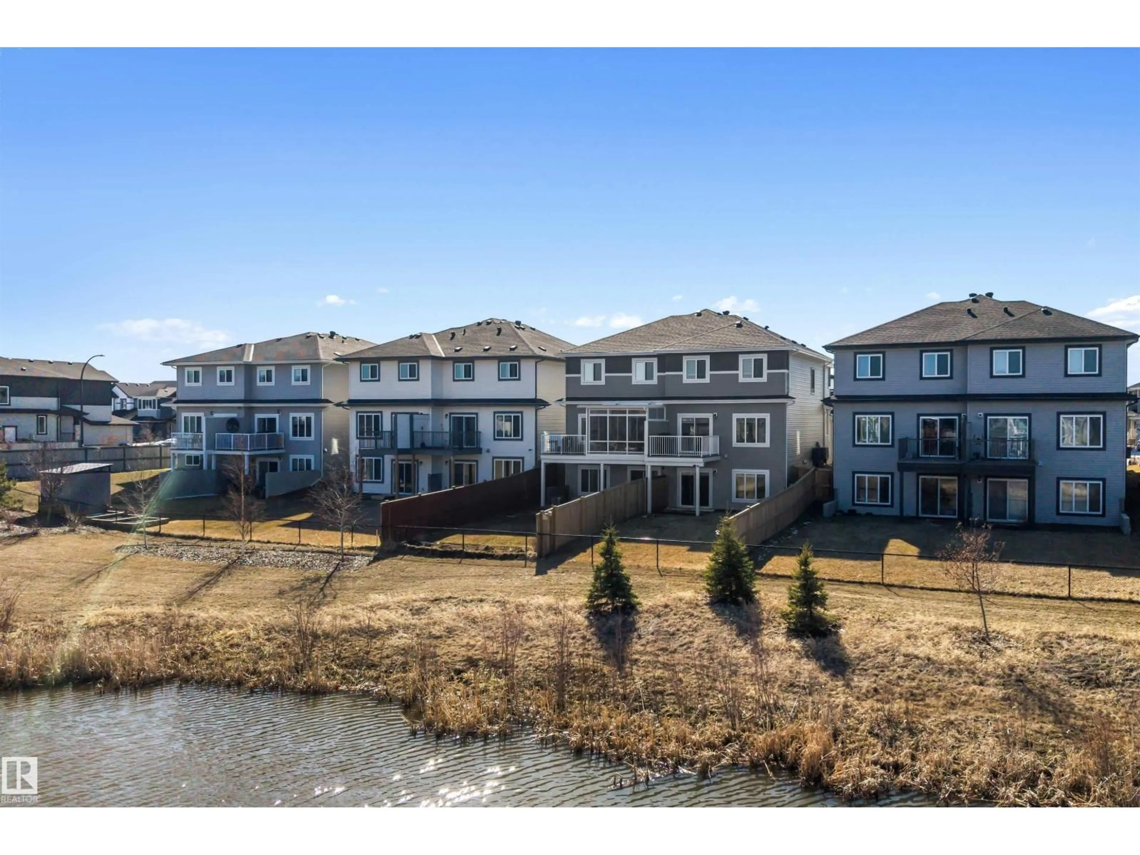 A pic from outside/outdoor area/front of a property/back of a property/a pic from drone, water/lake/river/ocean view for 12 AMBERLEY BA, Spruce Grove Alberta T7X2X4