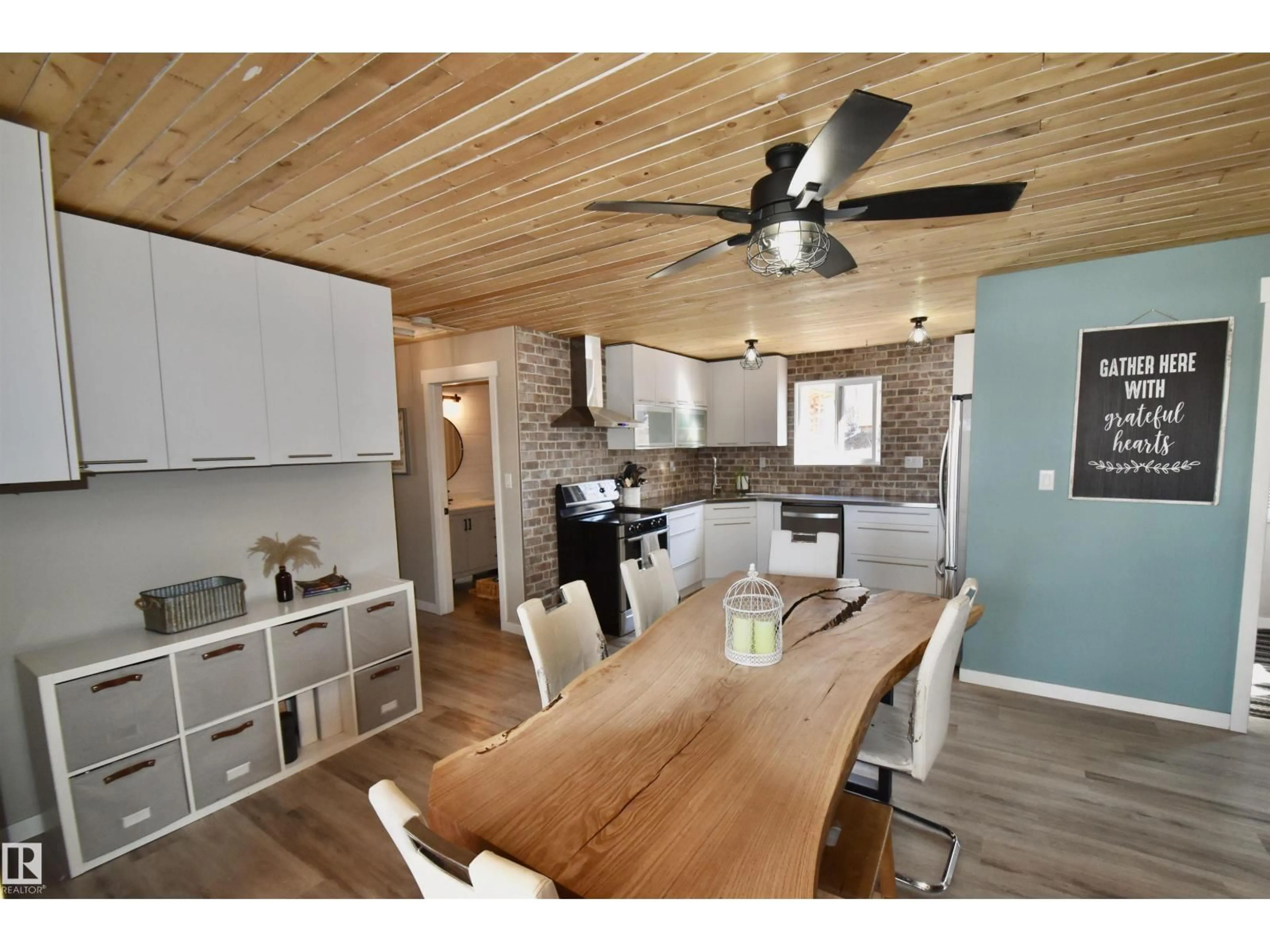 Open concept kitchen, wood/laminate floor for 634 11102 TWP RD 600 RD, Rural St. Paul County Alberta T0A3C0