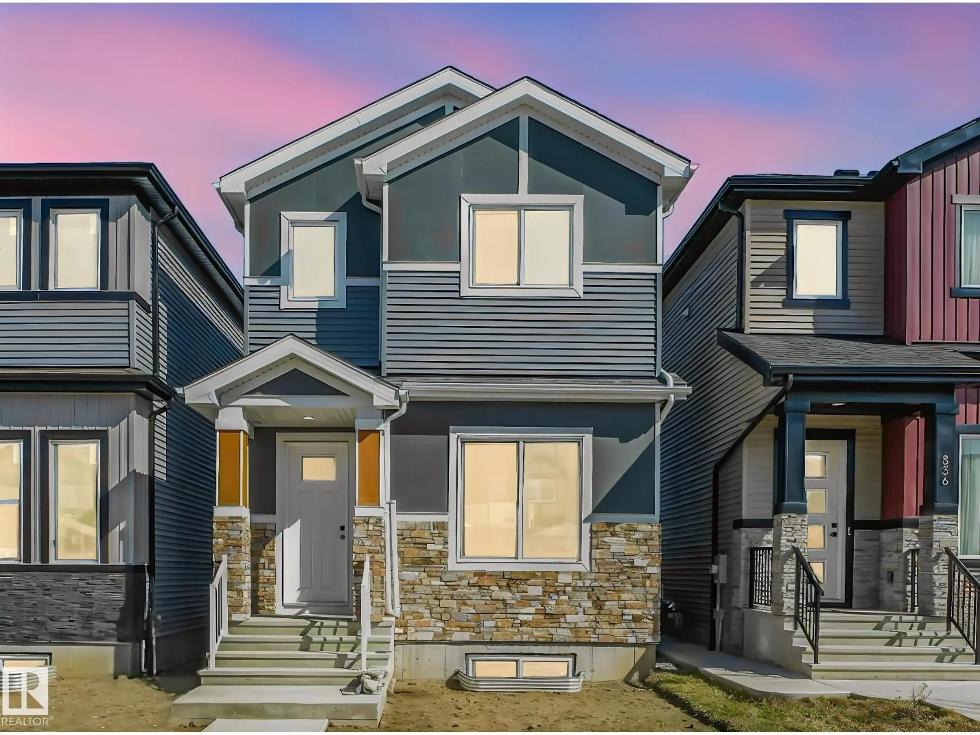 Home with vinyl exterior material, street for 838 NORTHERN HARRIER LN, Edmonton Alberta T5R2V5
