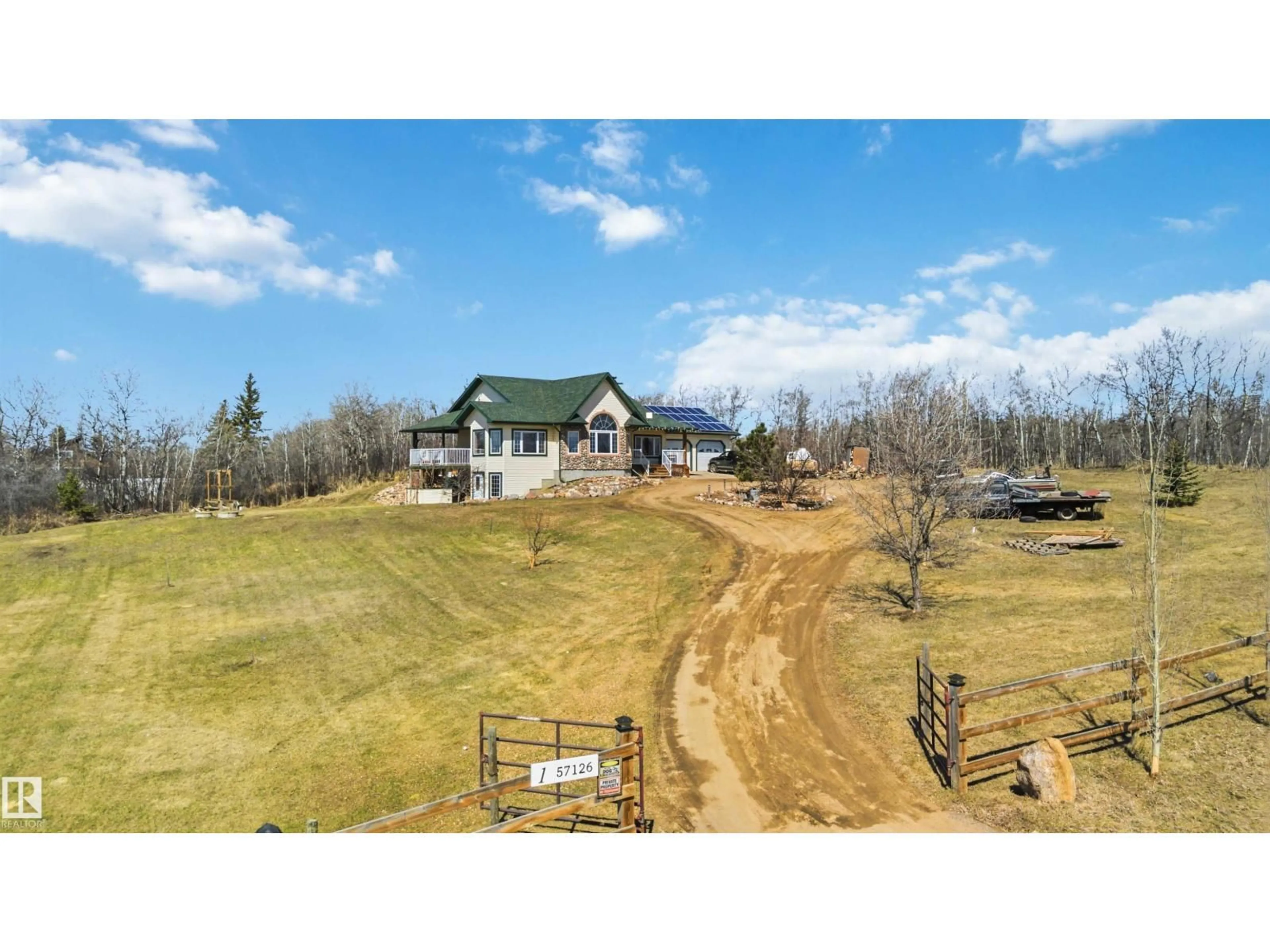A pic from outside/outdoor area/front of a property/back of a property/a pic from drone, unknown for 57126 RGE RD 233, Rural Sturgeon County Alberta T0A1N5