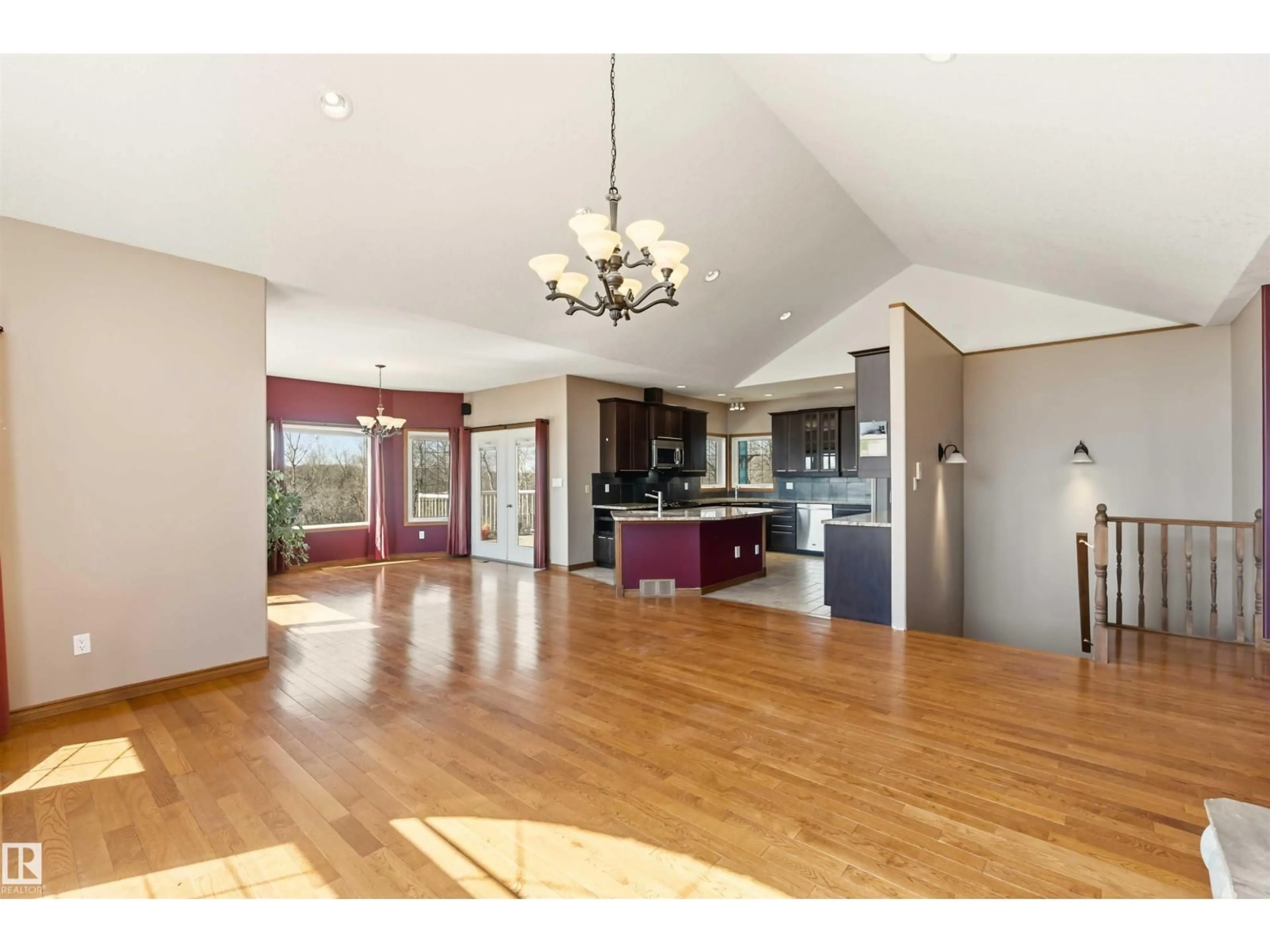 Open concept kitchen, wood/laminate floor for 57126 RGE RD 233, Rural Sturgeon County Alberta T0A1N5
