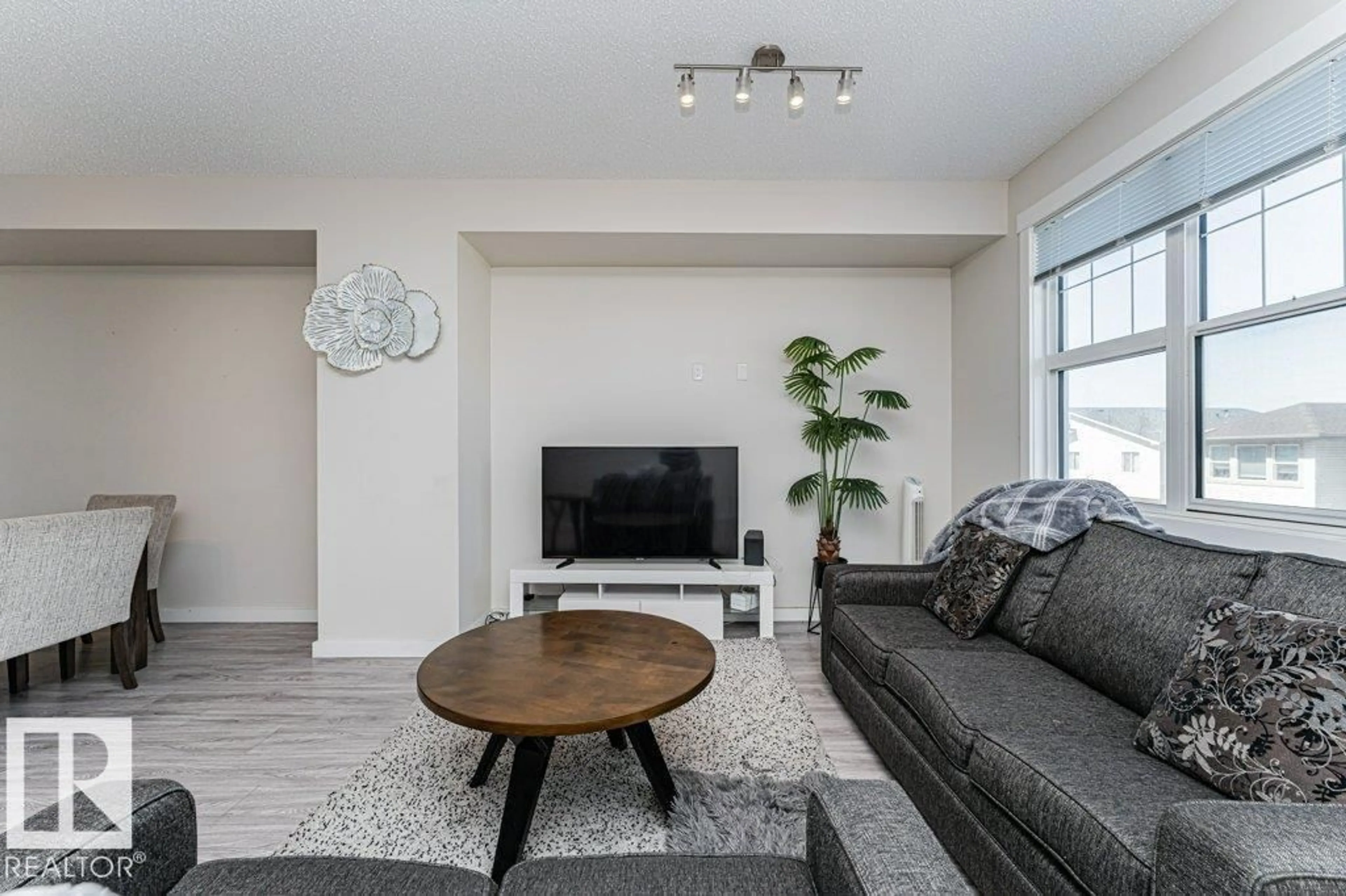 Living room with furniture, unknown for 903 - 30 CRYSTALLINA NERA WY, Edmonton Alberta T5Z0N6