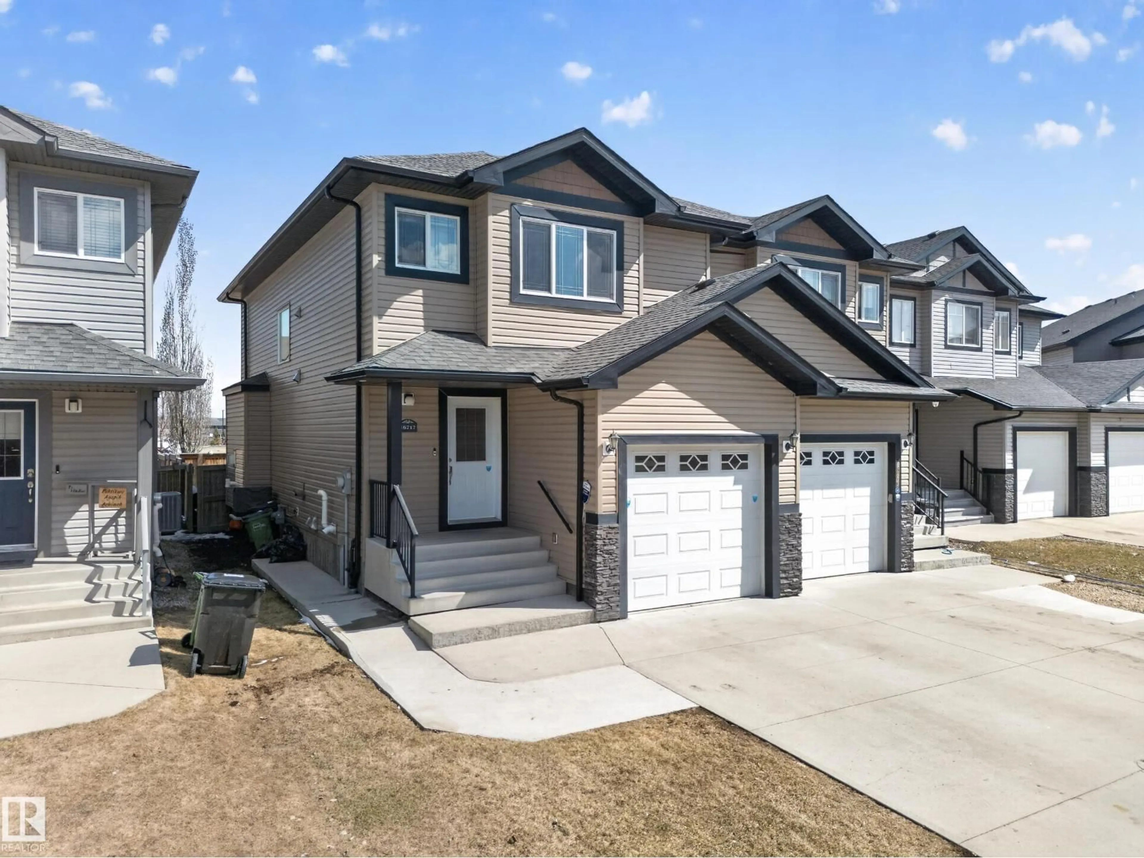 Home with vinyl exterior material, street for 16717 60 ST, Edmonton Alberta T5Y0W6