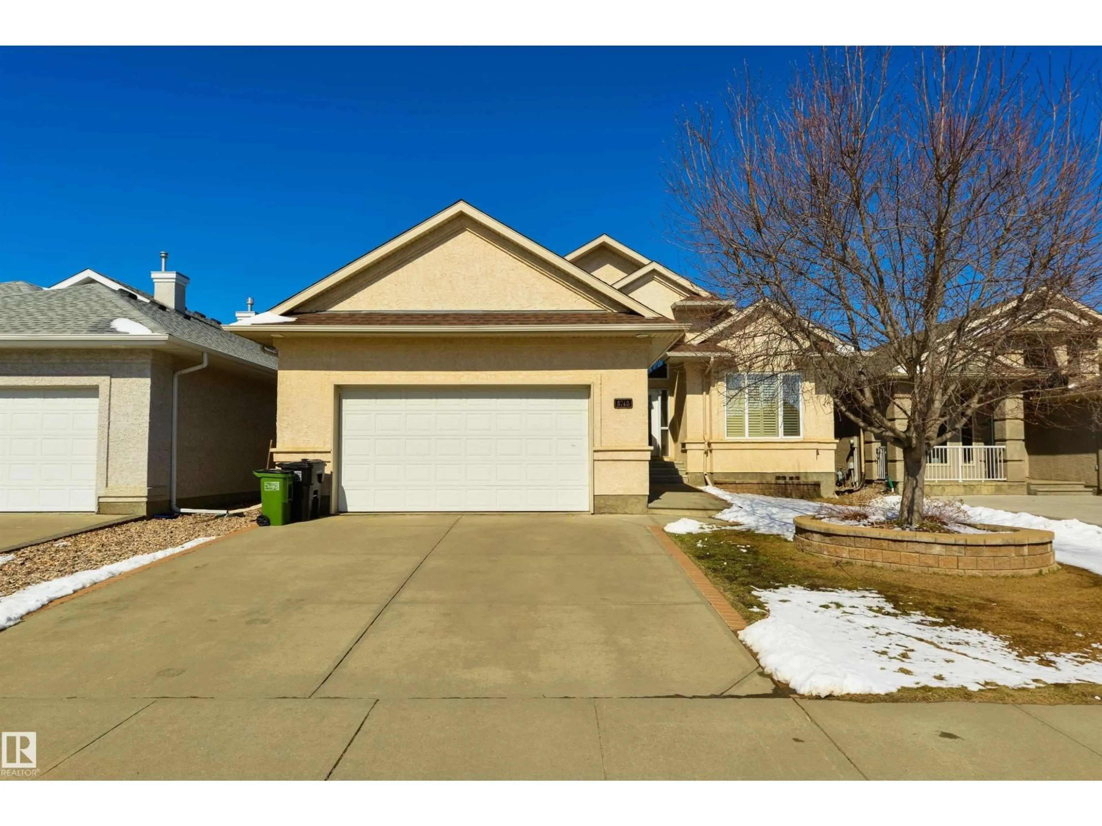 Home with vinyl exterior material, street for NW - 8748 208 ST, Edmonton Alberta T5T6Y2