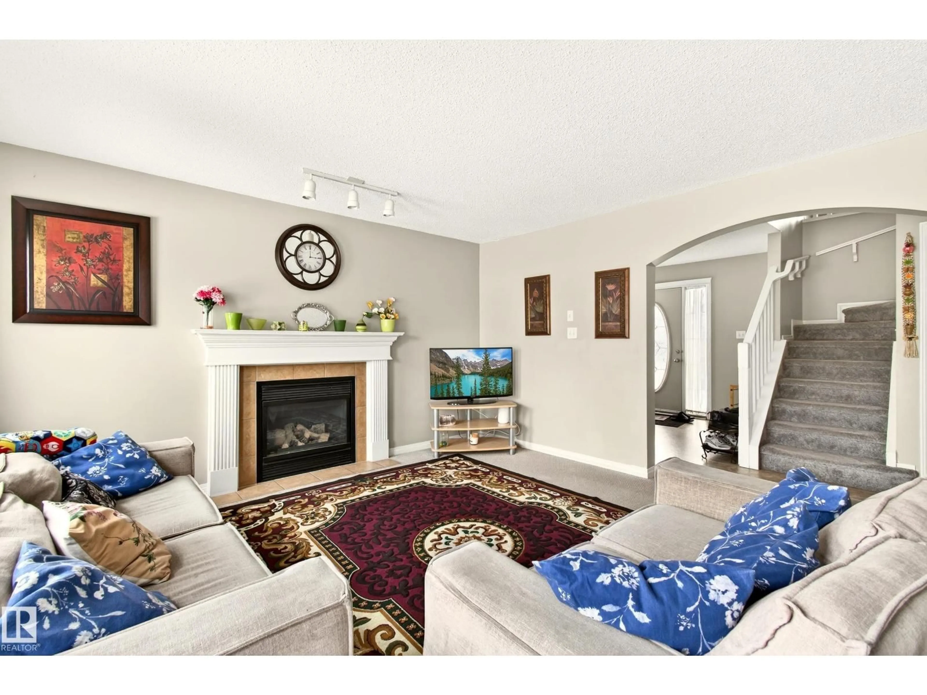 Living room with furniture, unknown for 8922 5AV SW, Edmonton Alberta T6X1C9