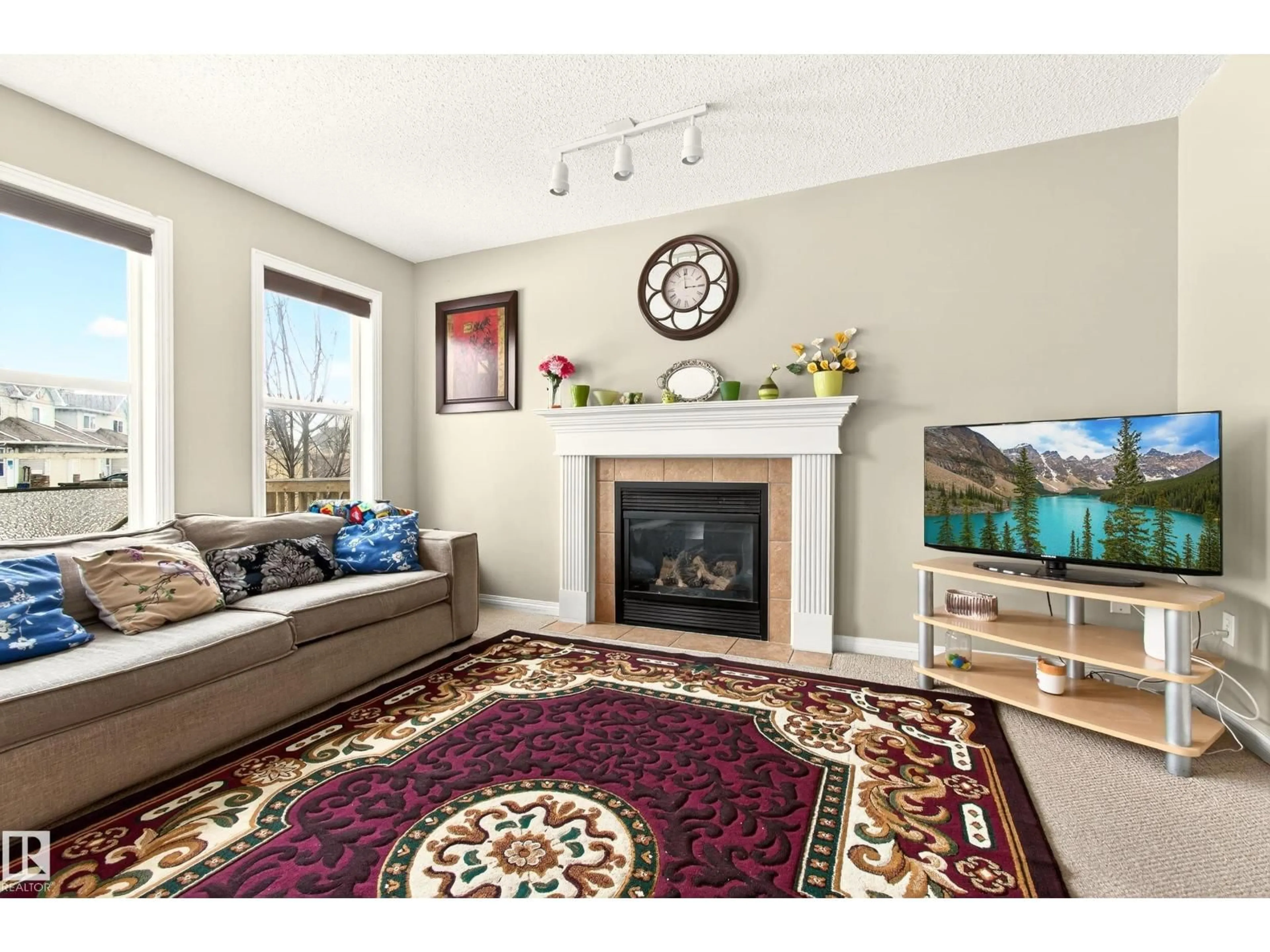 Living room with furniture, unknown for 8922 5AV SW, Edmonton Alberta T6X1C9
