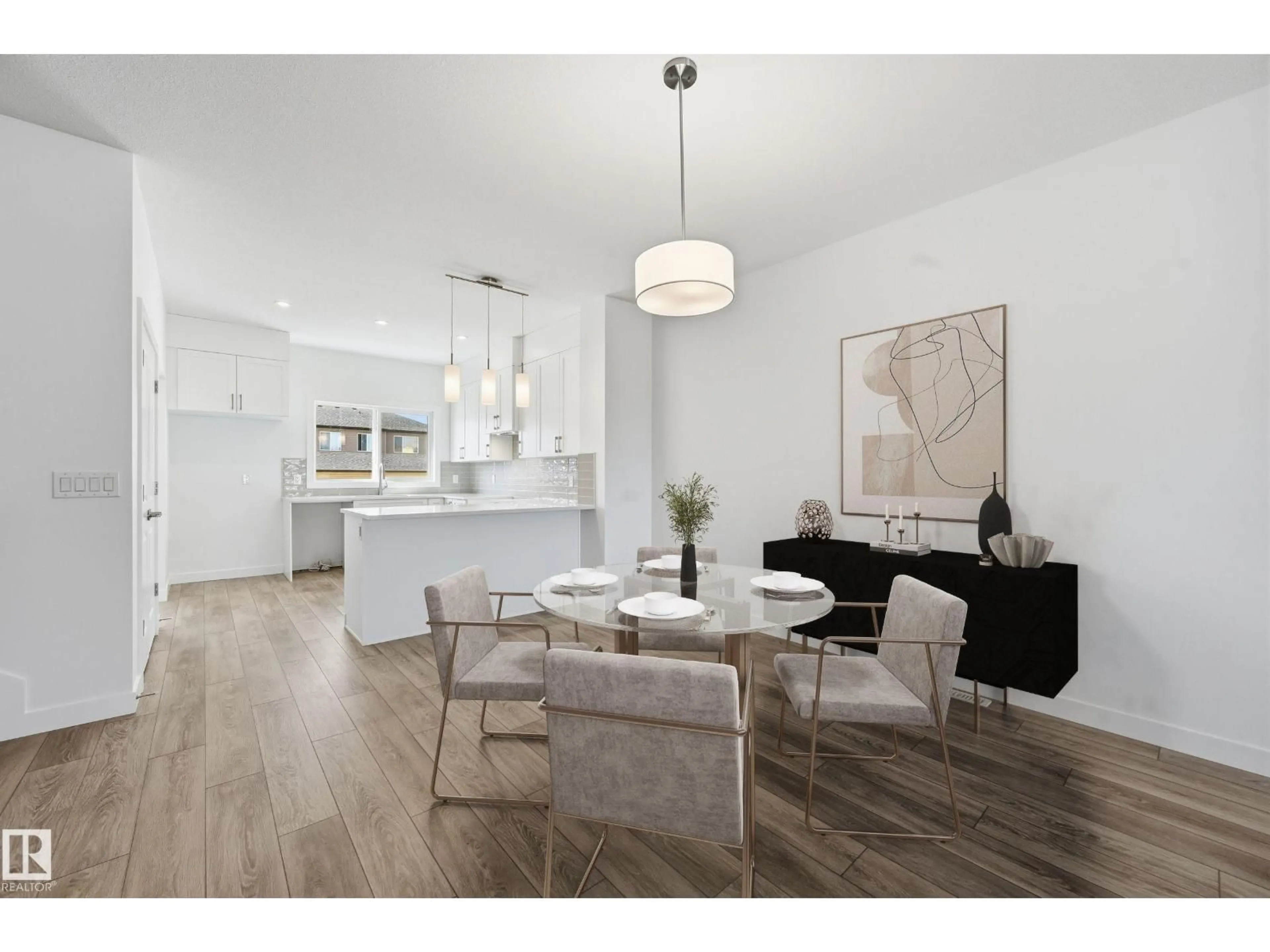 Open concept kitchen, wood/laminate floor for 205 WATTLE RD, Leduc Alberta T9E0V1