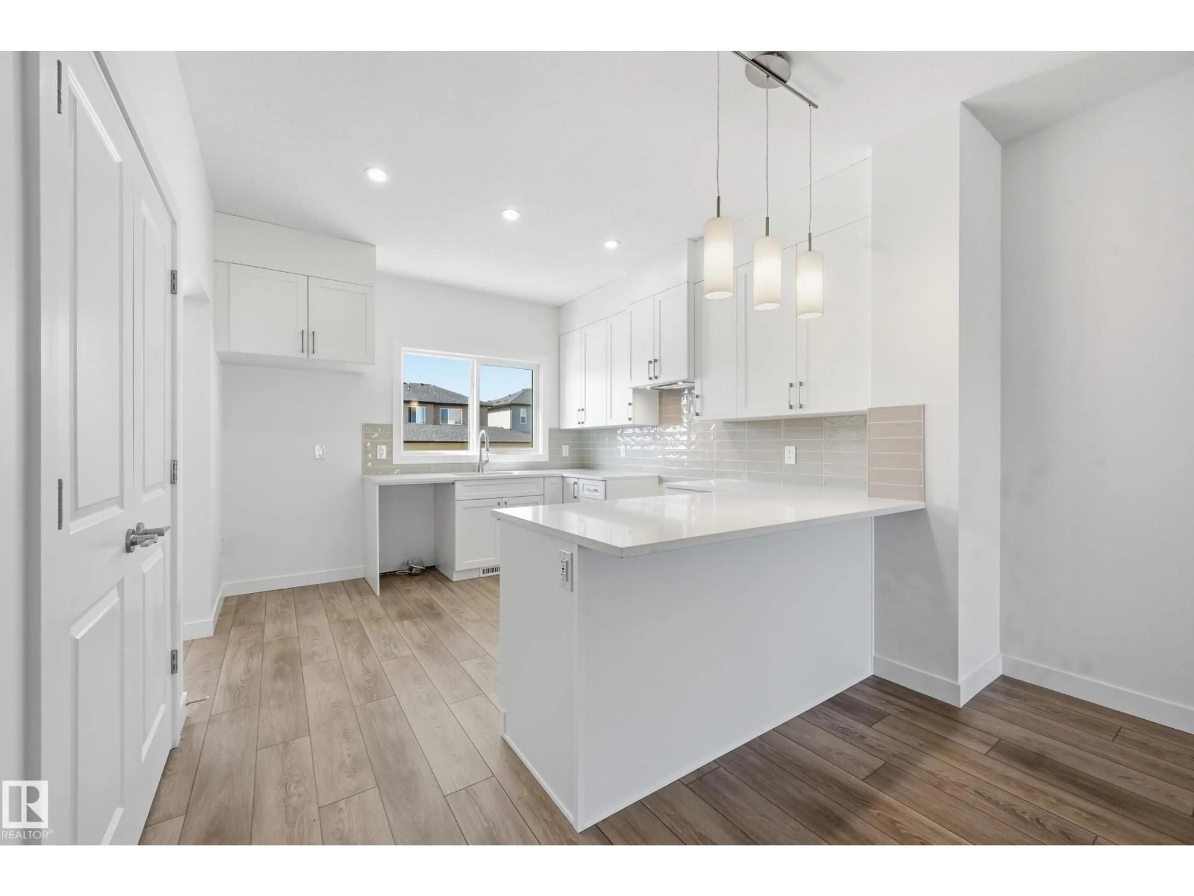 Open concept kitchen, unknown for 205 WATTLE RD, Leduc Alberta T9E0V1
