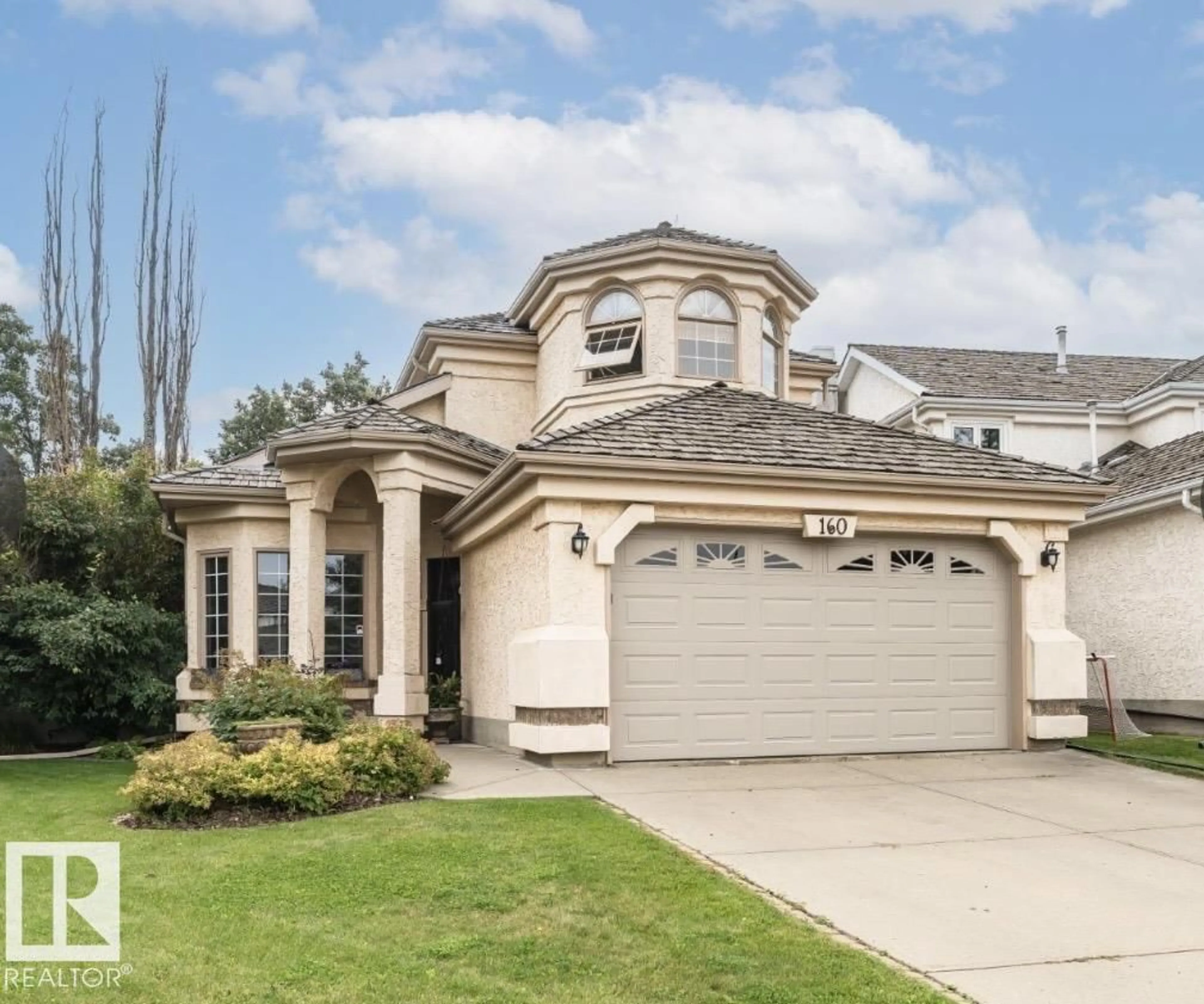 Home with vinyl exterior material, street for 160 CARLSON CL, Edmonton Alberta T6R2J7