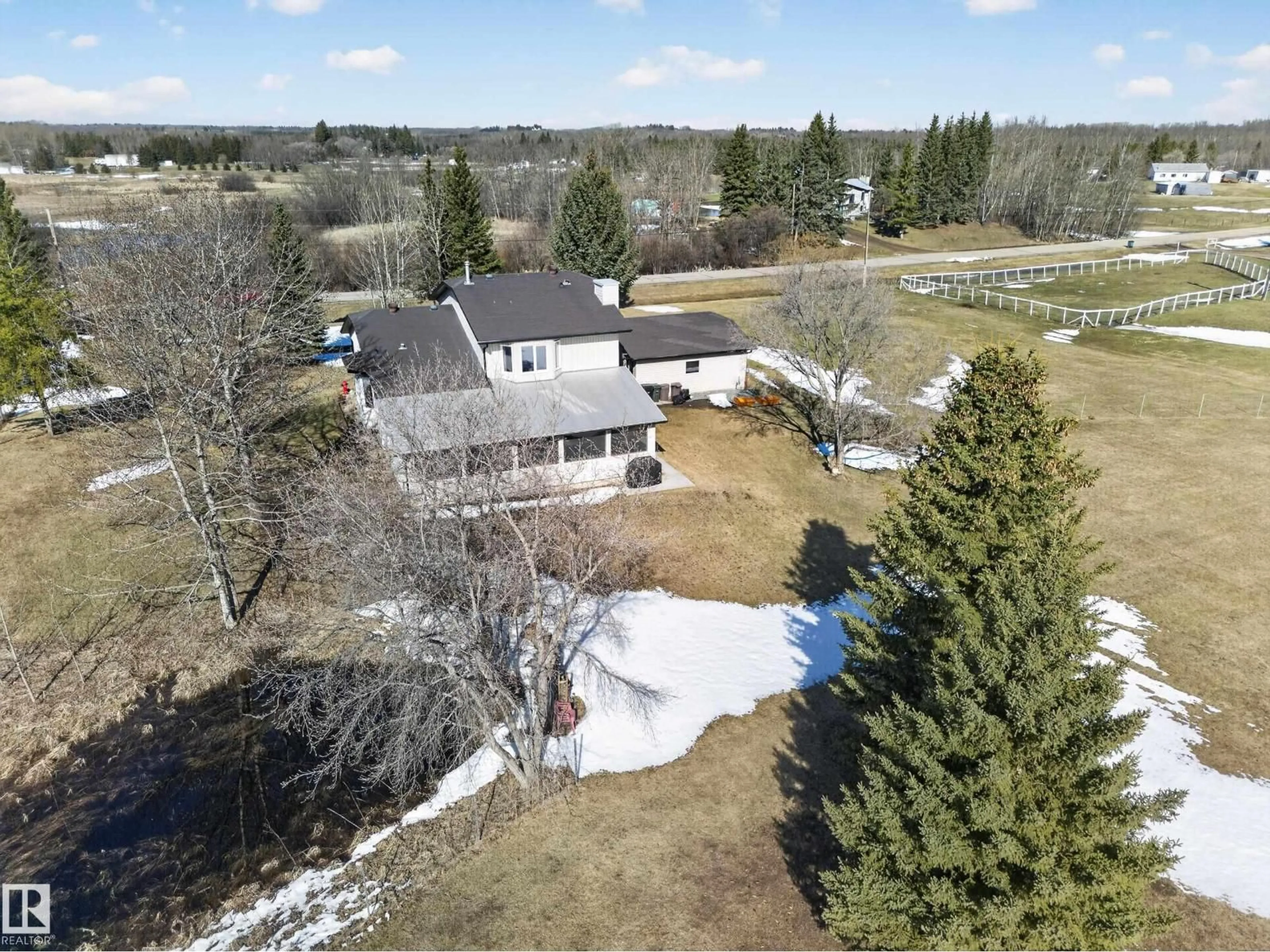 A pic from outside/outdoor area/front of a property/back of a property/a pic from drone, unknown for 301 - 52471 RGE ROAD 223, Rural Strathcona County Alberta T8A4P9