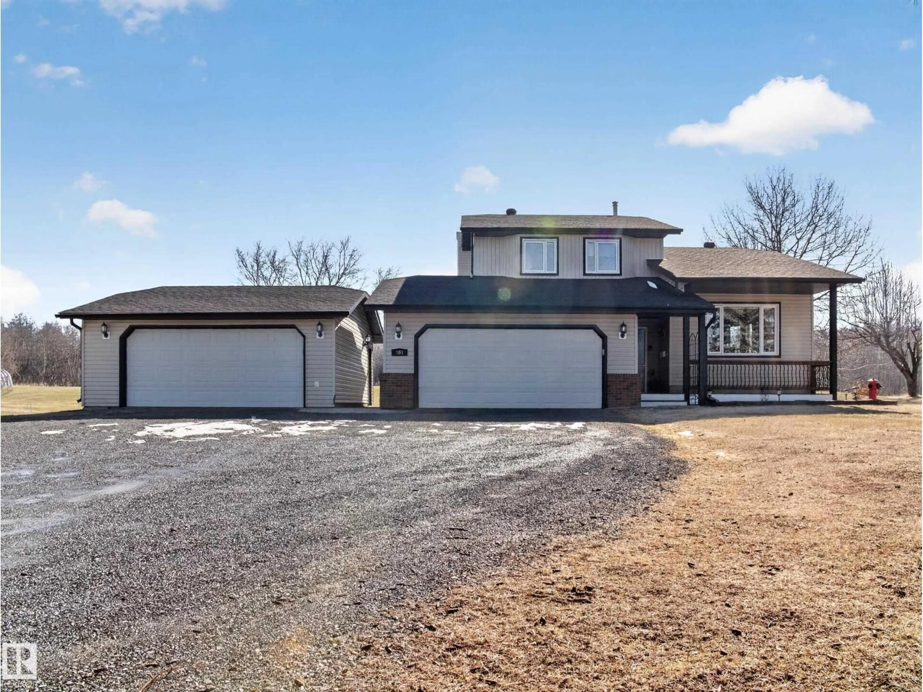 A pic from outside/outdoor area/front of a property/back of a property/a pic from drone, street for 301 - 52471 RGE ROAD 223, Rural Strathcona County Alberta T8A4P9