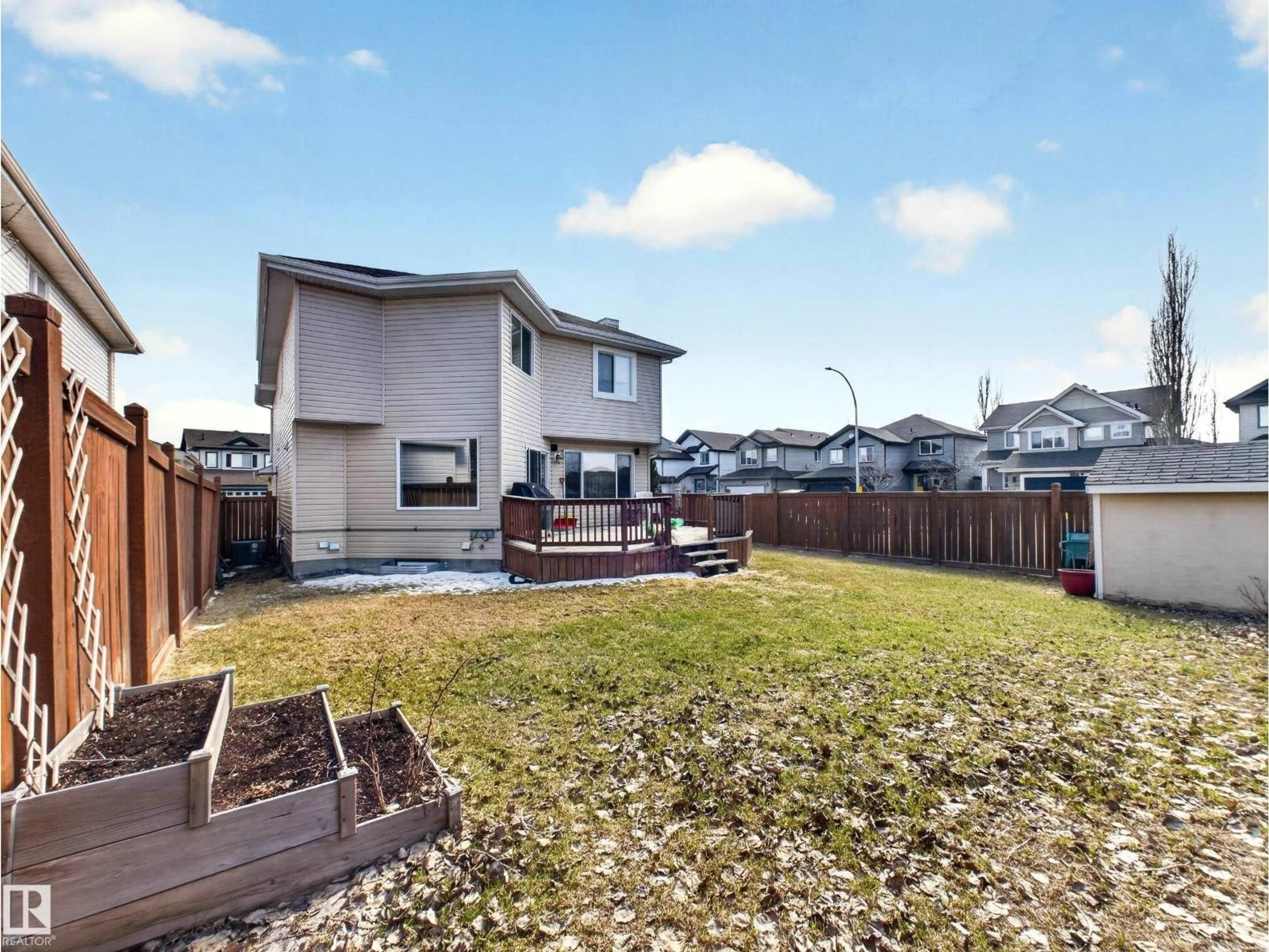A pic from outside/outdoor area/front of a property/back of a property/a pic from drone, street for 9522 103 AV, Morinville Alberta T8R0B4