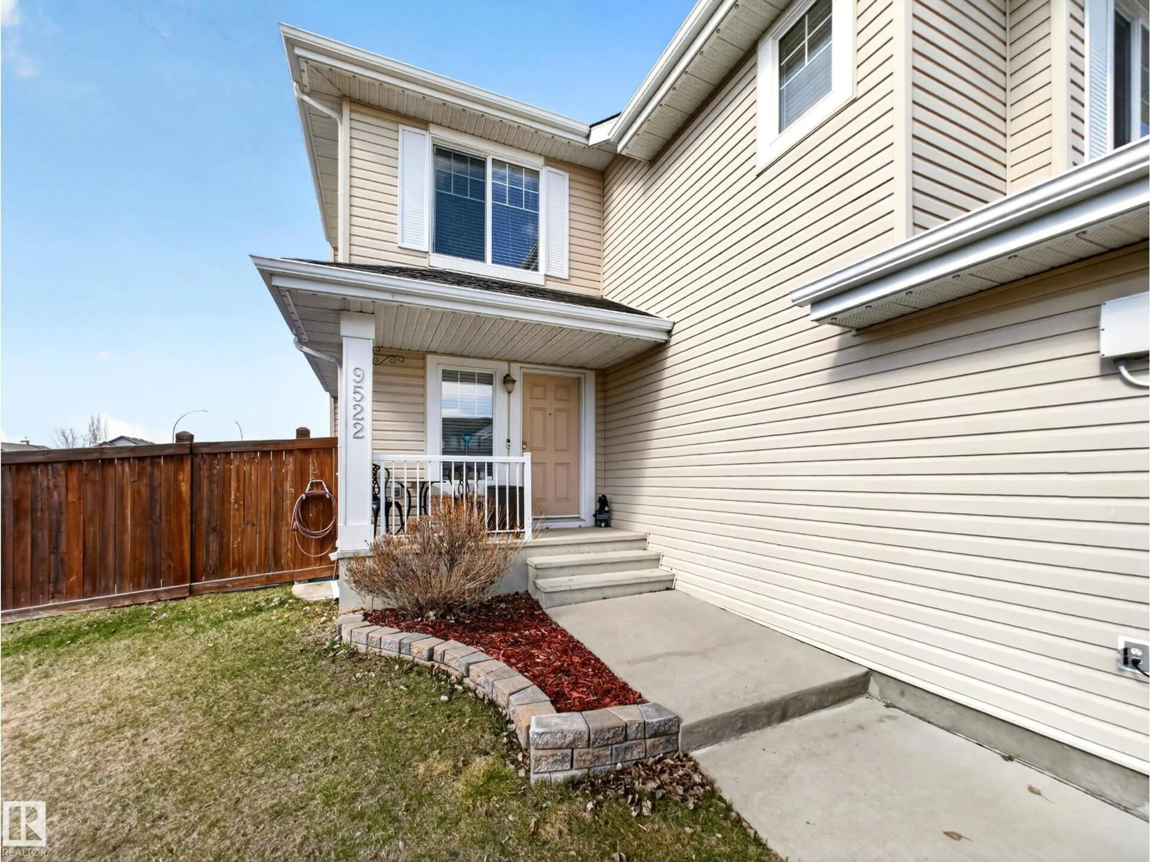 Home with brick exterior material, street for 9522 103 AV, Morinville Alberta T8R0B4