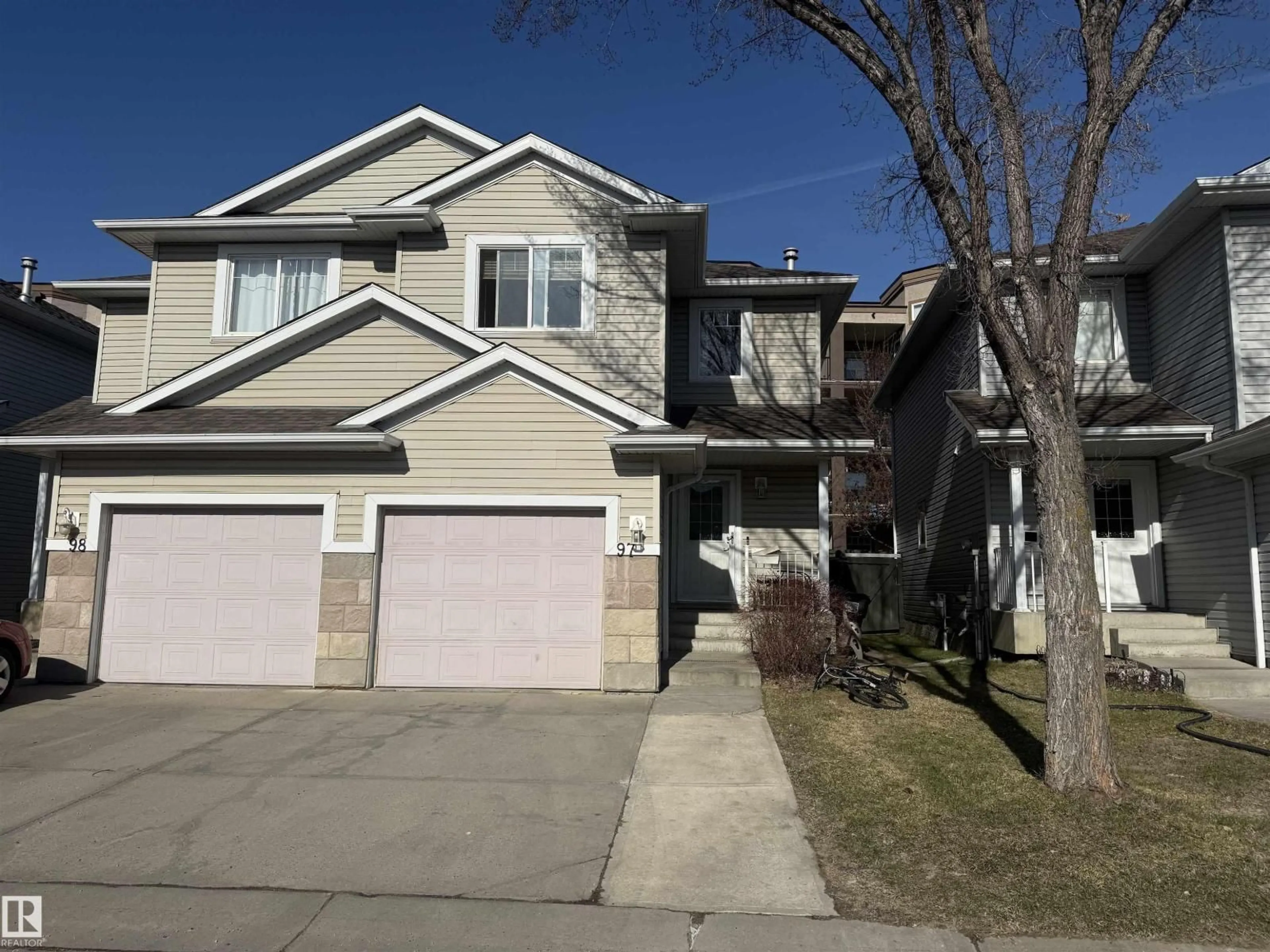 Home with vinyl exterior material, street for #97 - 2021 GRANTHAM CT, Edmonton Alberta T5T6V7