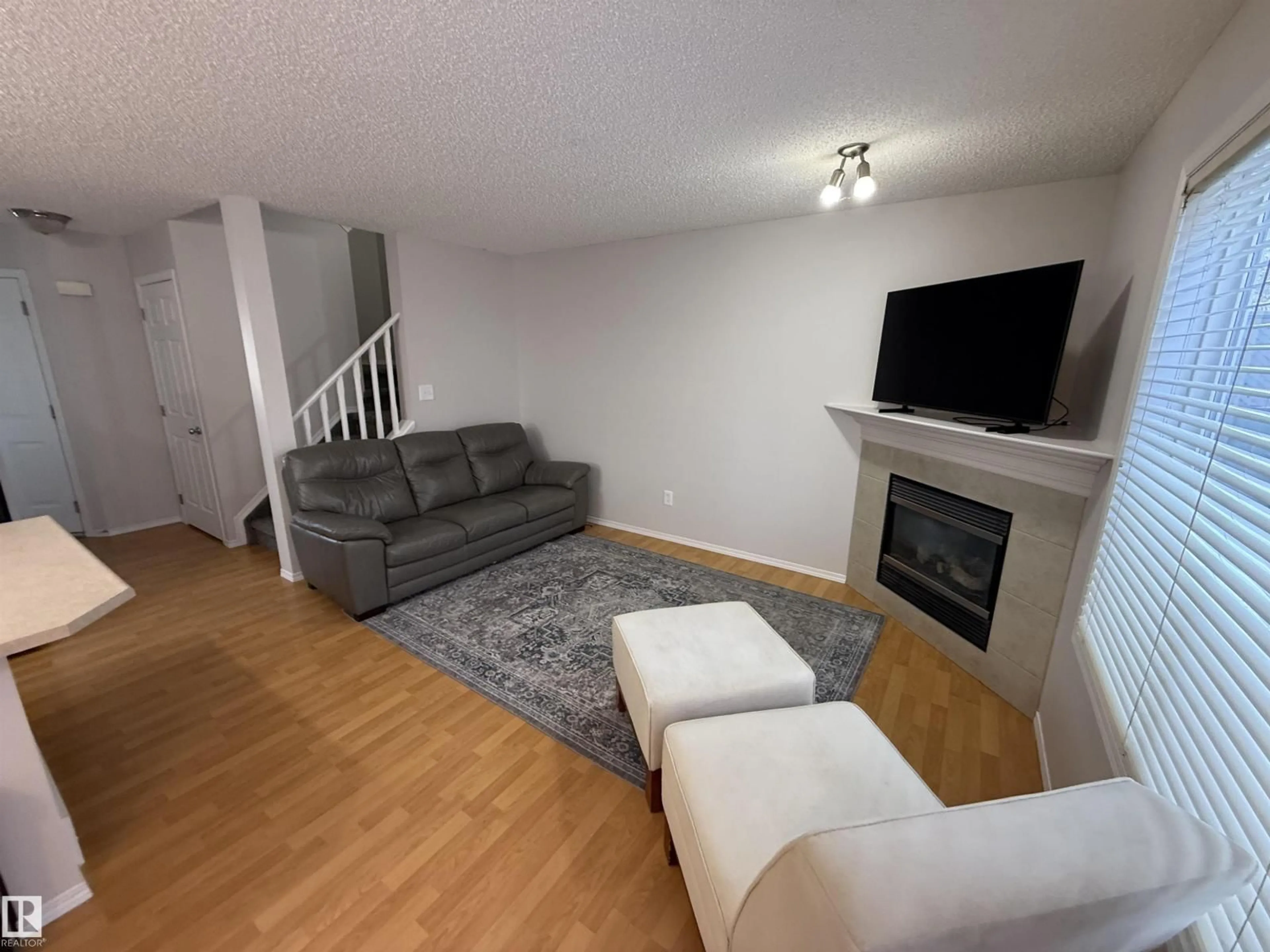 Living room with furniture, unknown for #97 - 2021 GRANTHAM CT, Edmonton Alberta T5T6V7