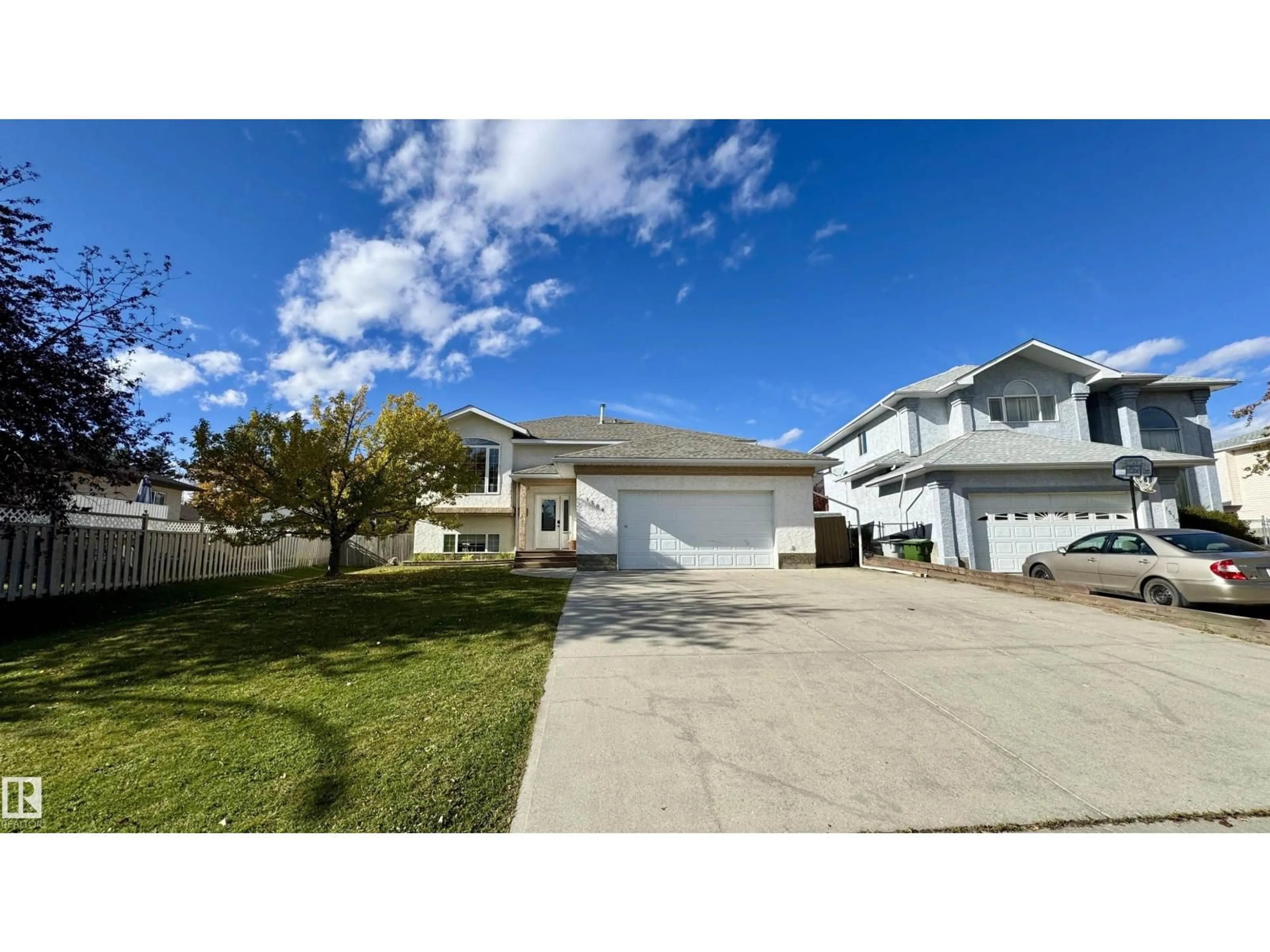 Home with vinyl exterior material, street for 1506 54 ST, Edson Alberta T7E1H3
