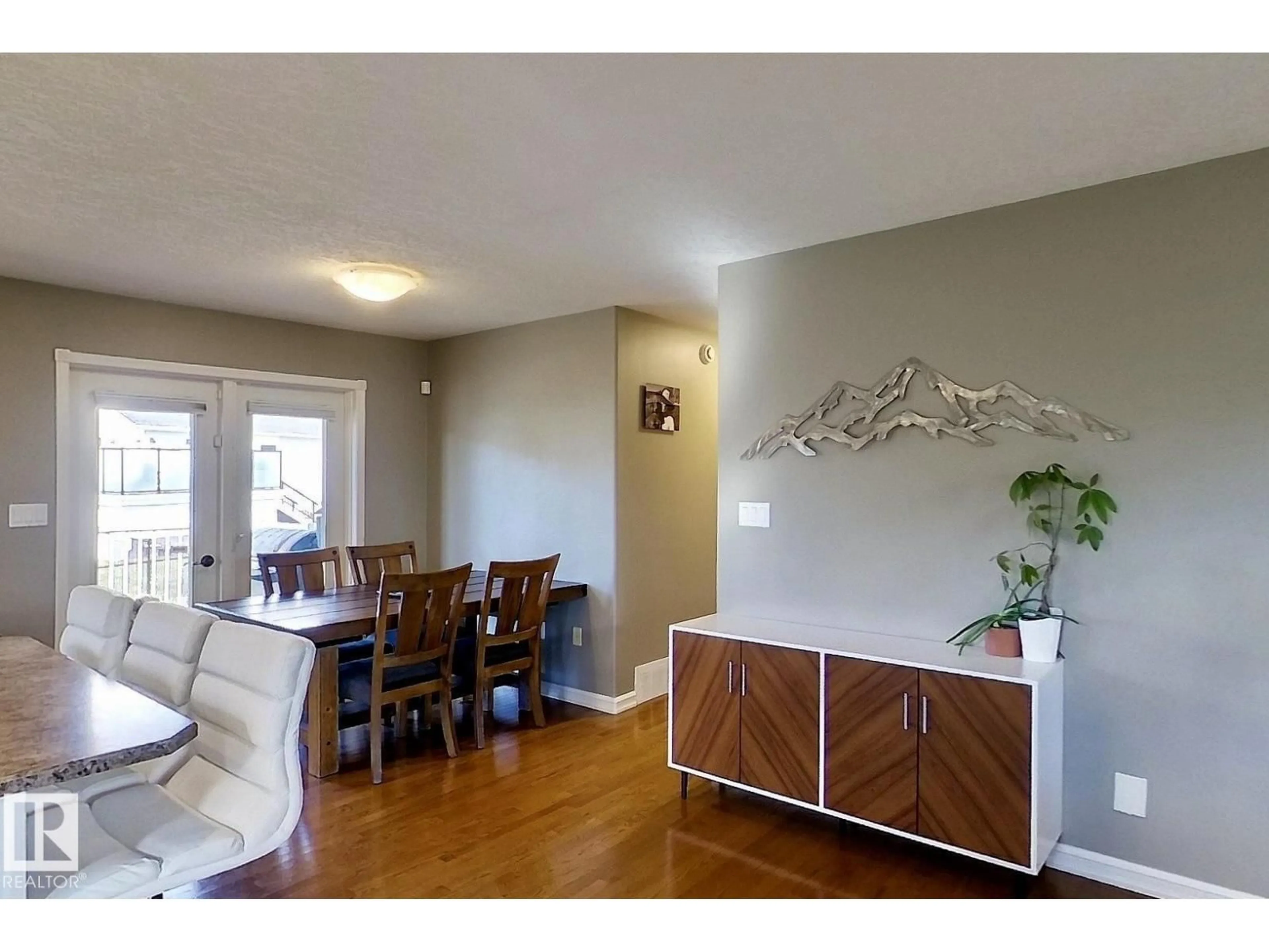 Dining room, wood/laminate floor for 1506 54 ST, Edson Alberta T7E1H3