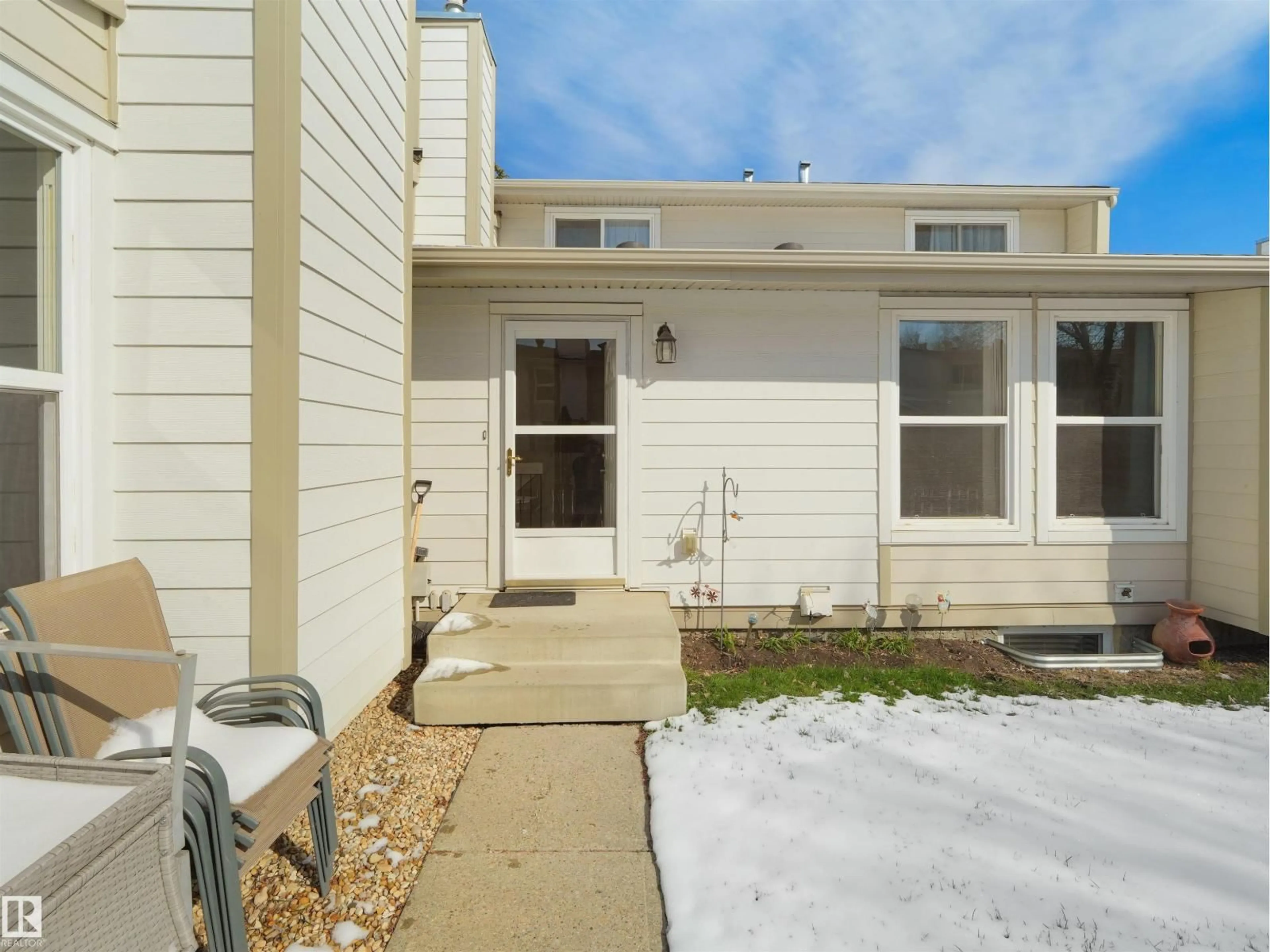 Home with vinyl exterior material, street for 1164 KNOTTWOOD RD, Edmonton Alberta T6K2K5