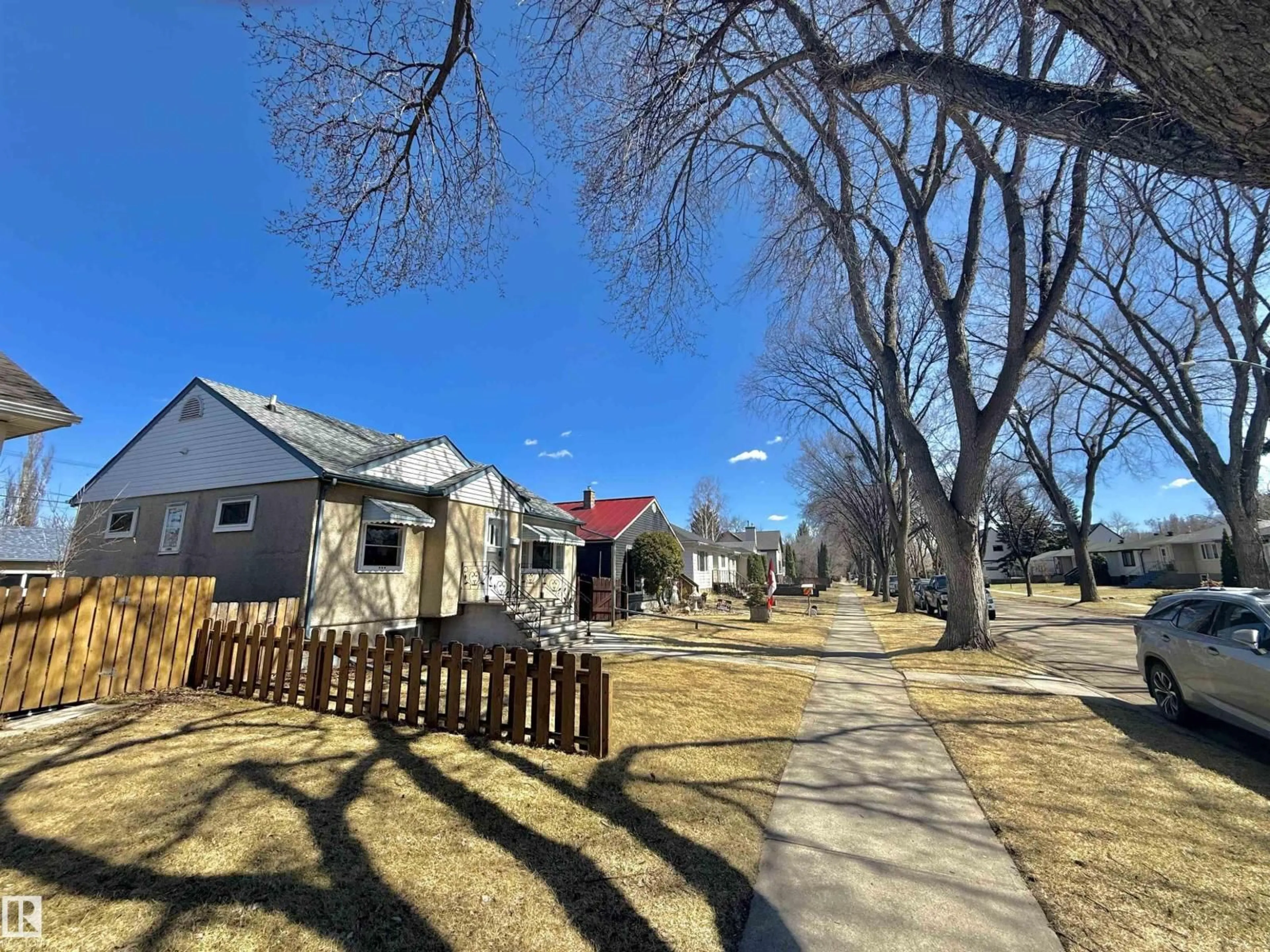 A pic from outside/outdoor area/front of a property/back of a property/a pic from drone, street for 9330 72 AV, Edmonton Alberta T6E0V8