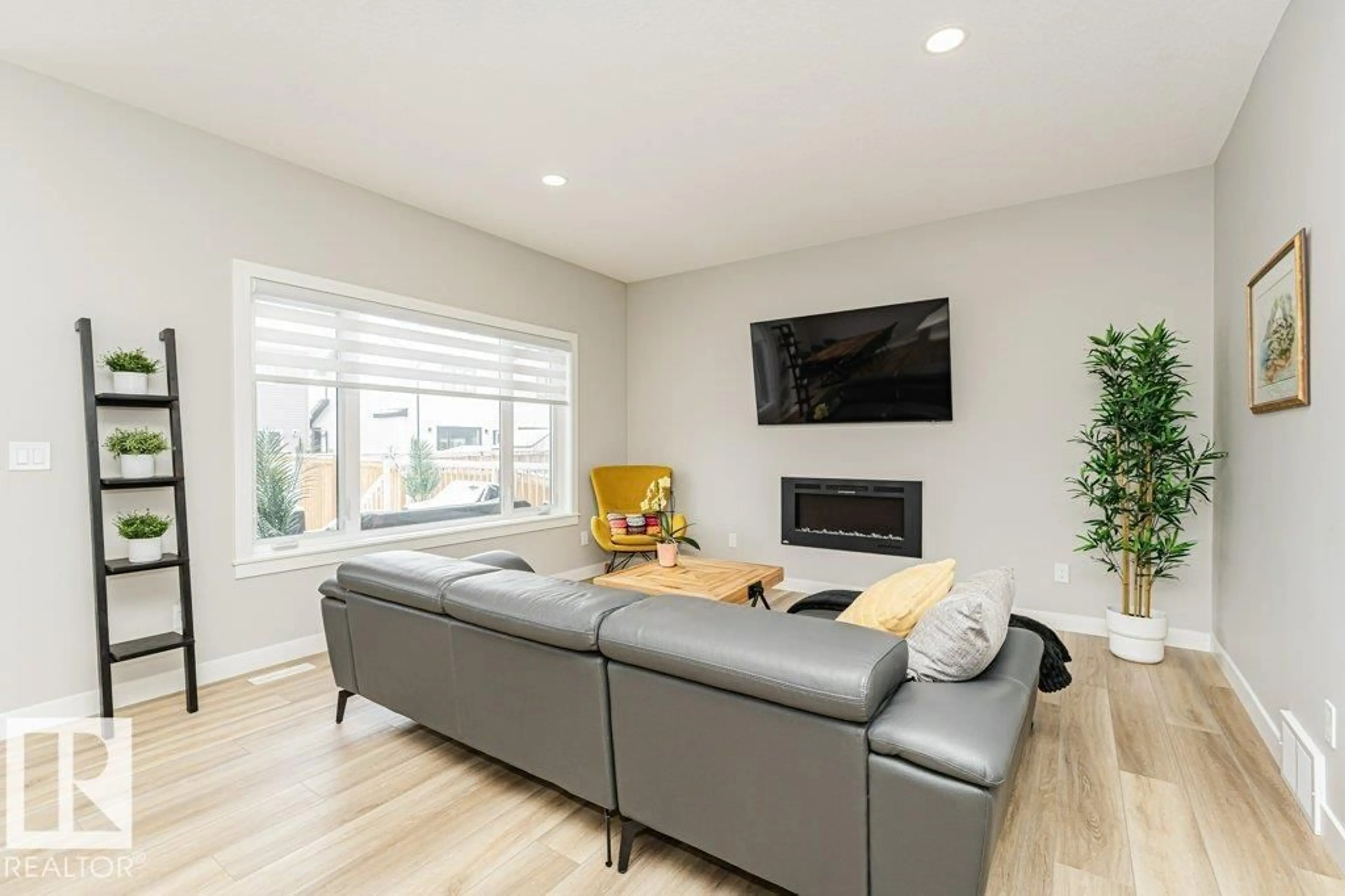 Living room with furniture, unknown for 10606 96 ST, Morinville Alberta T8R2N5