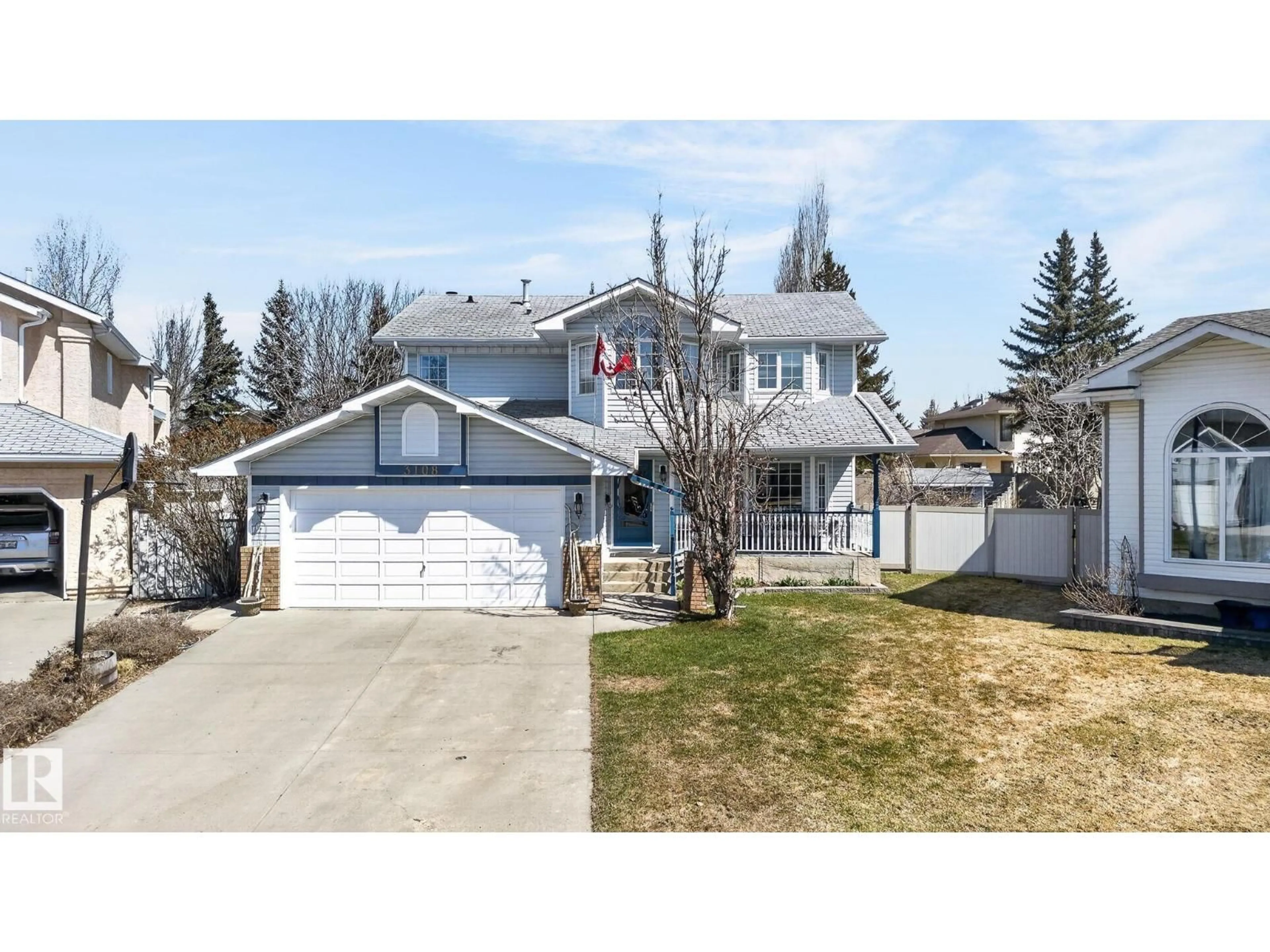 Home with vinyl exterior material, street for 3108 36B AV, Edmonton Alberta T6T1H4