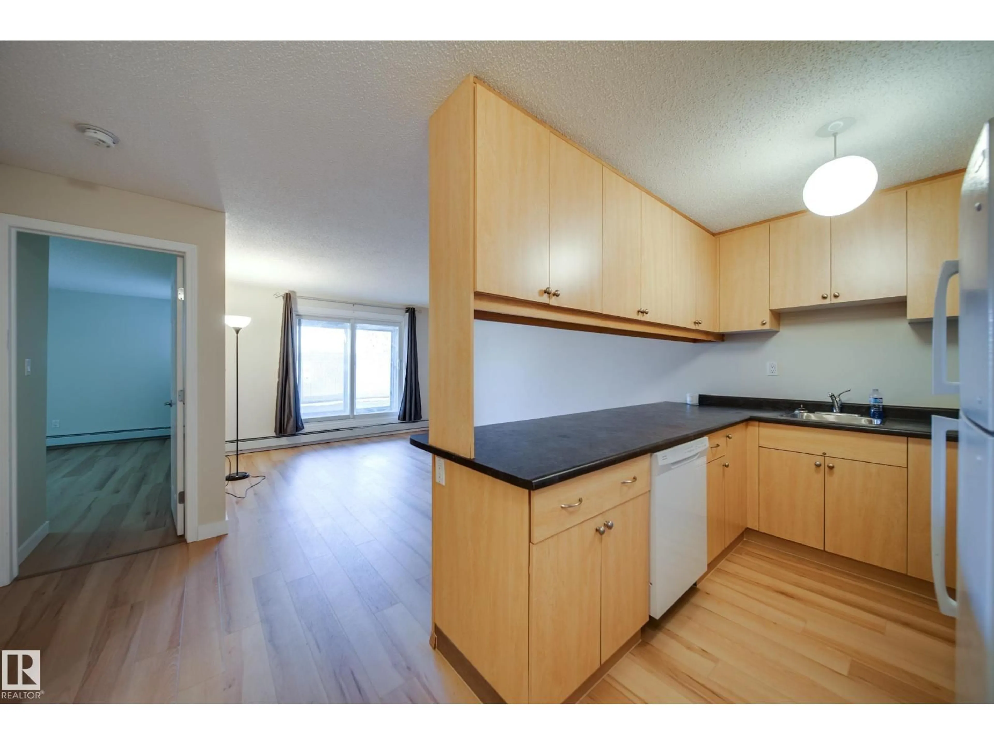 Standard kitchen, wood/laminate floor for #106 - 2628 MILL WOODS RD E, Edmonton Alberta T6L5G1
